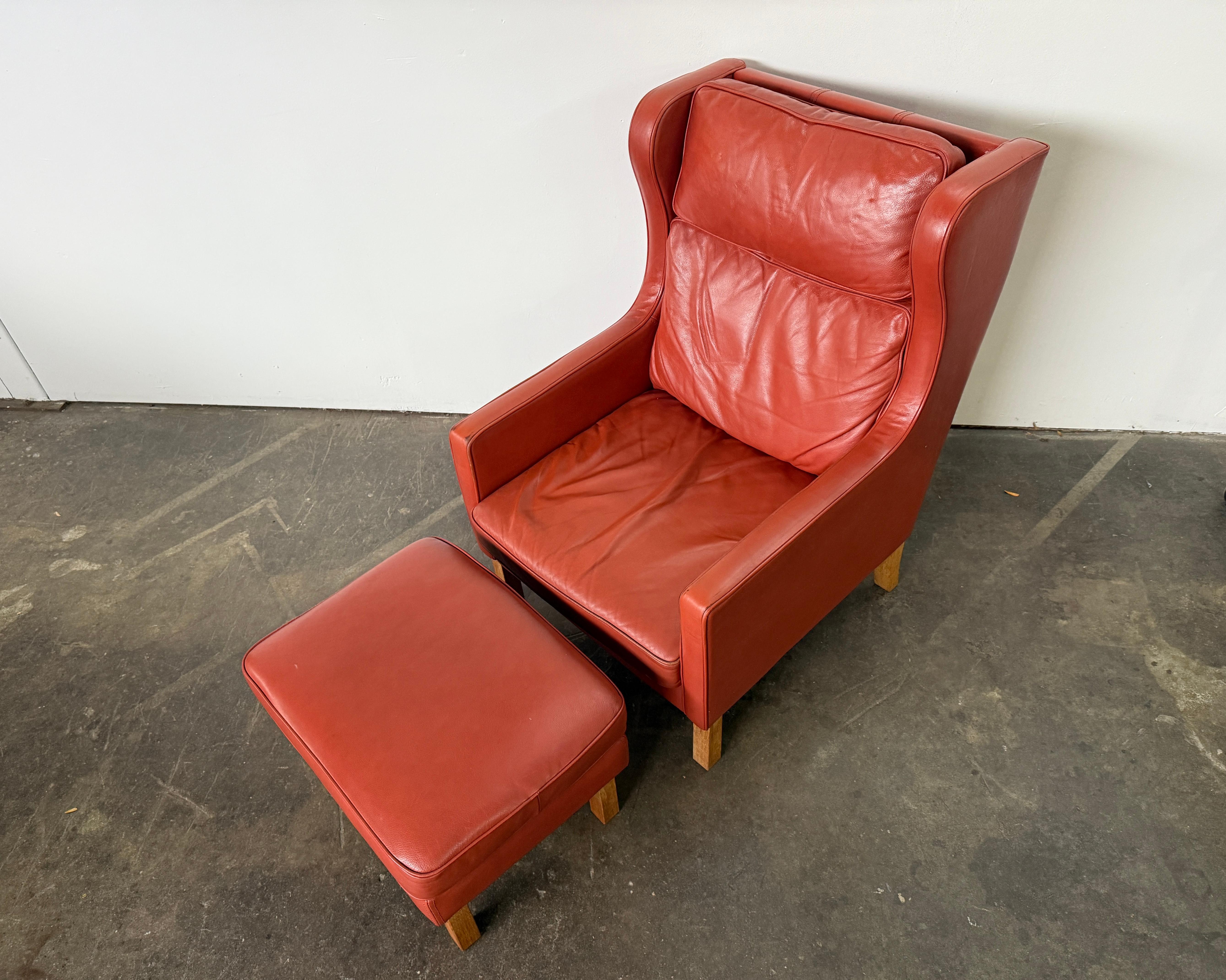 Danish Beautiful Mid Century Scandinavian modern Red Leather Wingback Chair Ottoman For Sale