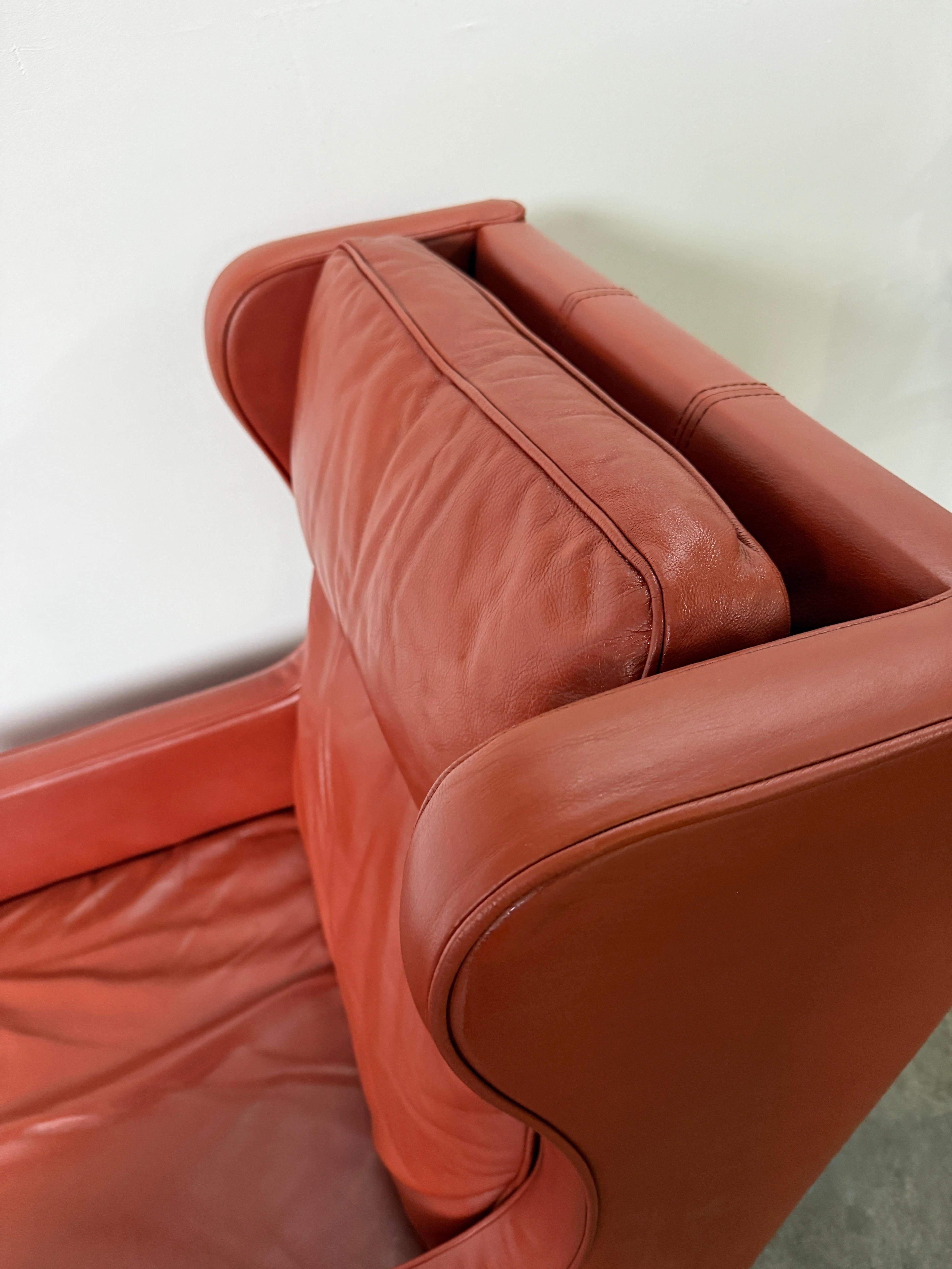 Beautiful Mid Century Scandinavian modern Red Leather Wingback Chair Ottoman In Good Condition For Sale In Brooklyn, NY