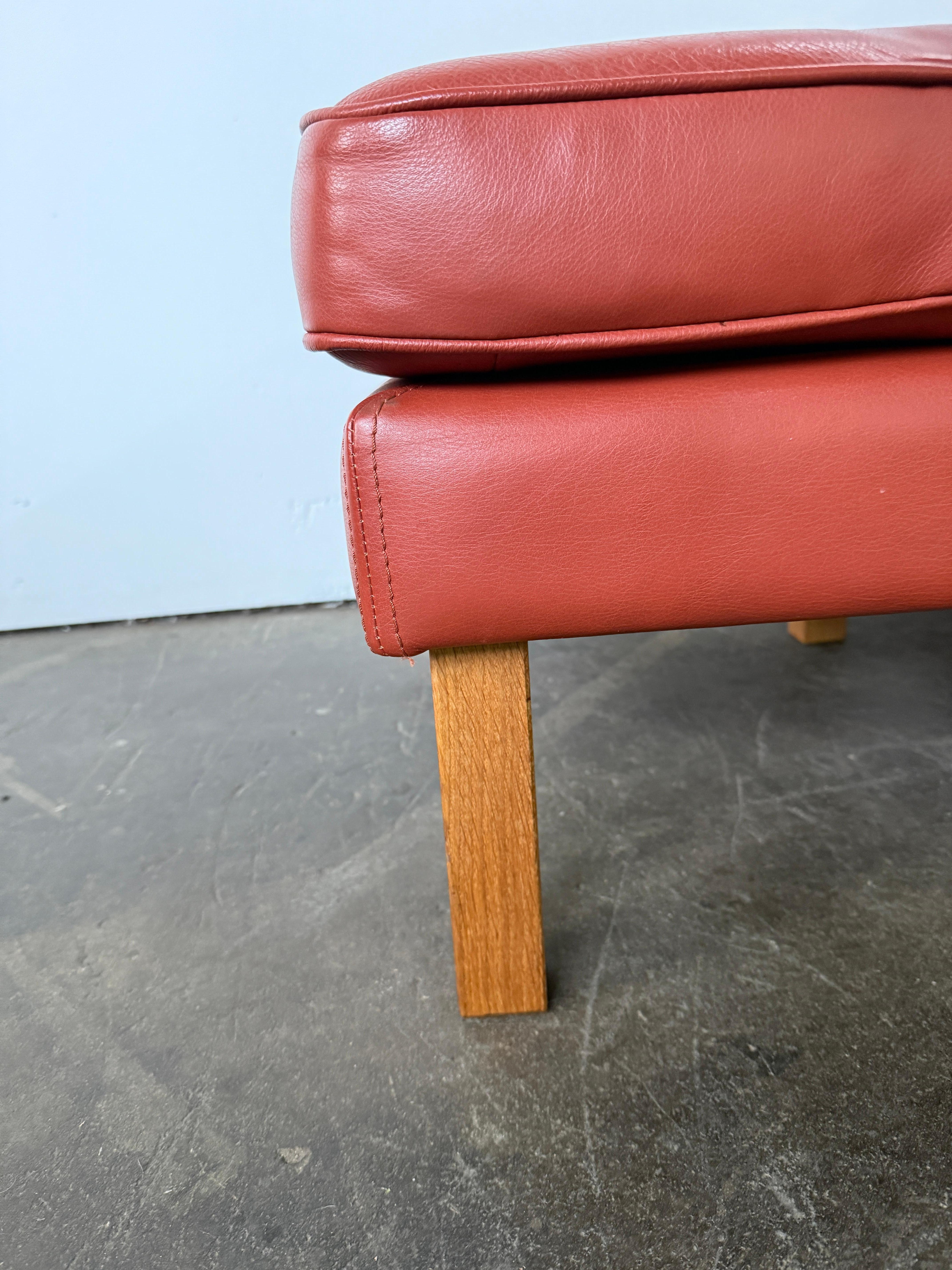 Mid-20th Century Beautiful Mid Century Scandinavian modern Red Leather Wingback Chair Ottoman For Sale