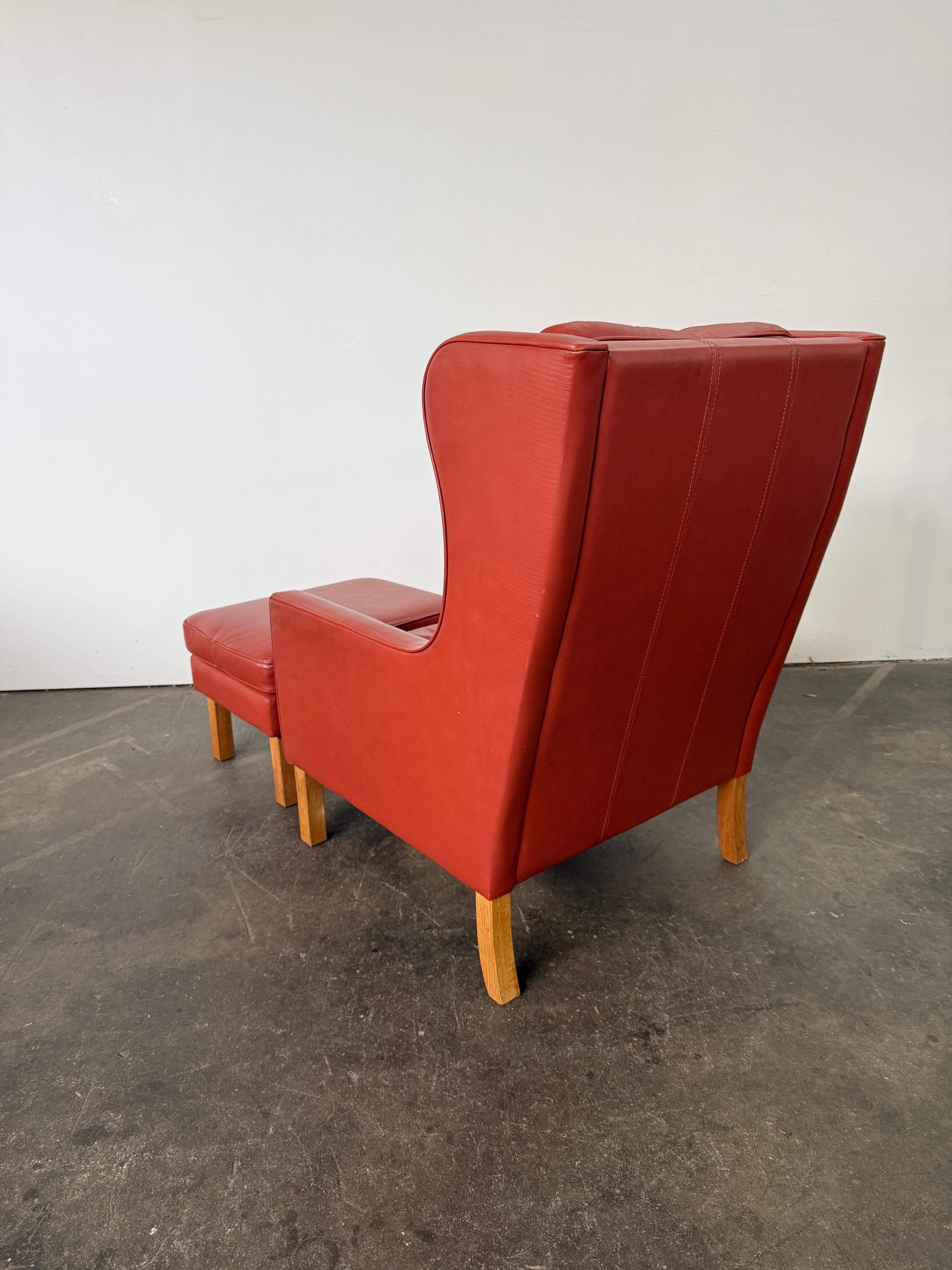 Beautiful Mid Century Scandinavian modern Red Leather Wingback Chair Ottoman For Sale 1