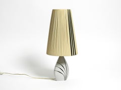 Beautiful mid-century table lamp made of ceramic and plastic shade by Alka Kunst