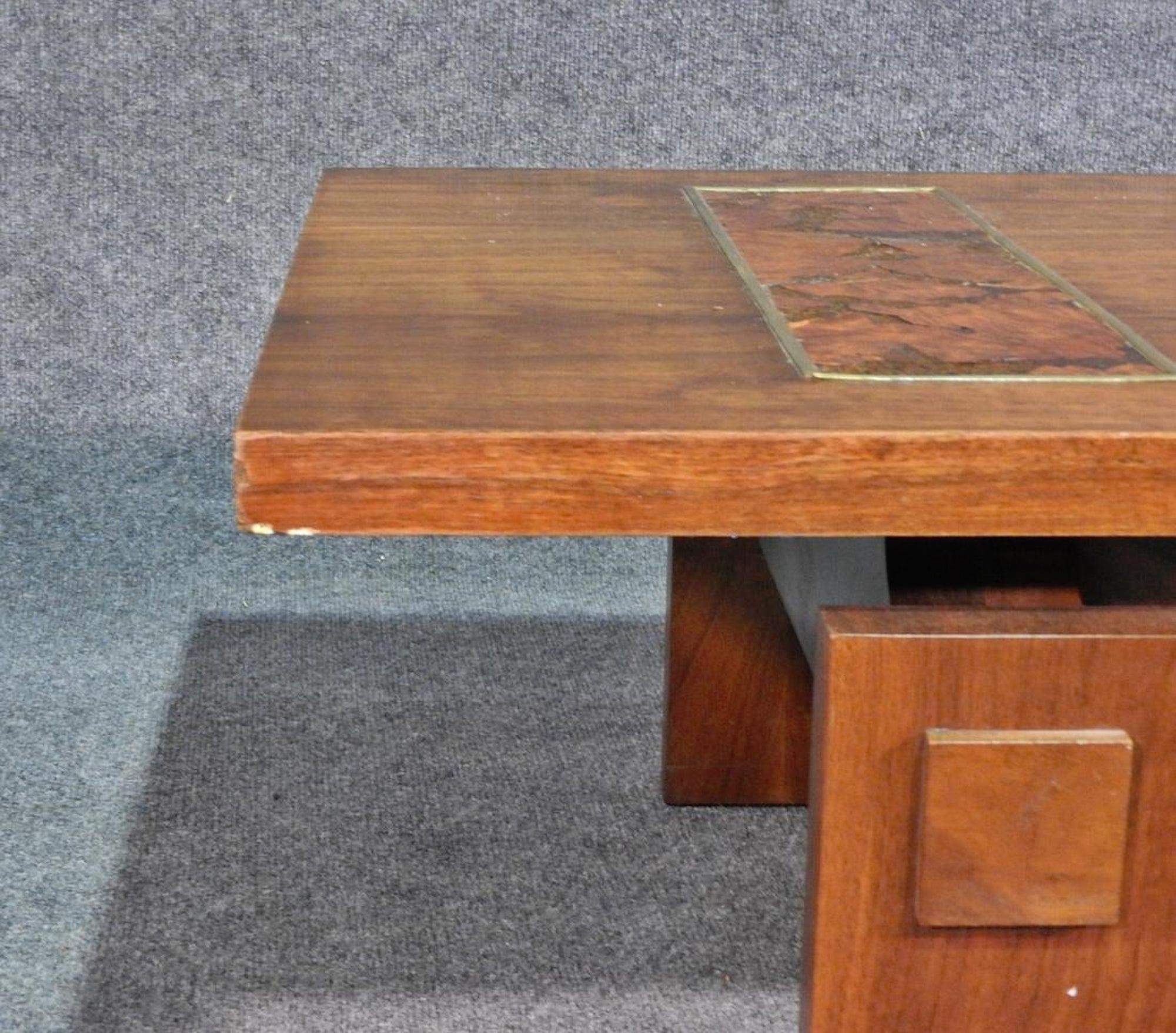 Mid-Century Modern coffee table with brilliant burl wood inlay. Unique design by Lane.
(Please confirm item location - NY or NJ - with dealer).
  