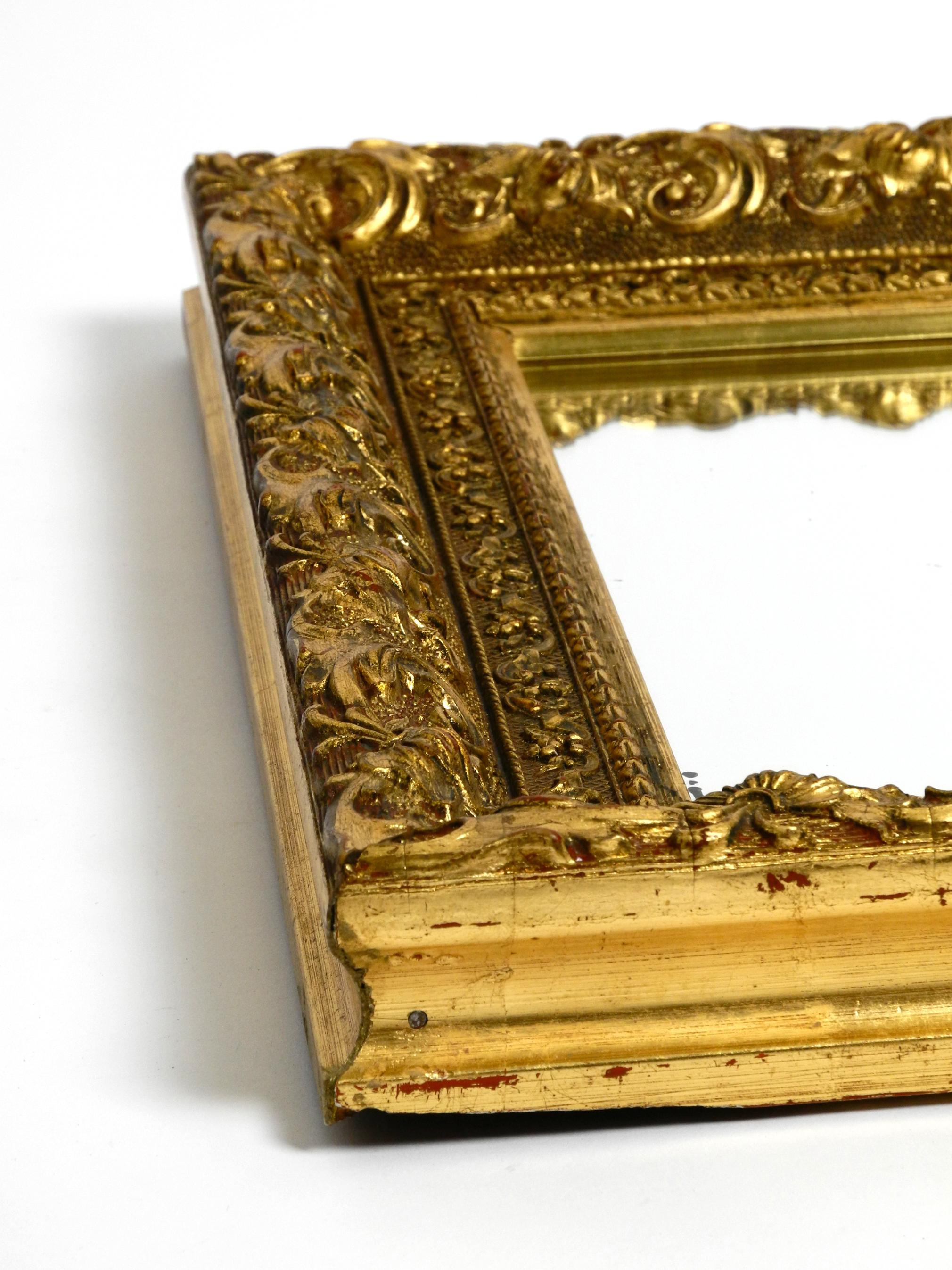 Beautiful Mid Century Wall Mirror from Italy with an Ornate, Gold-Plated Frame For Sale 6