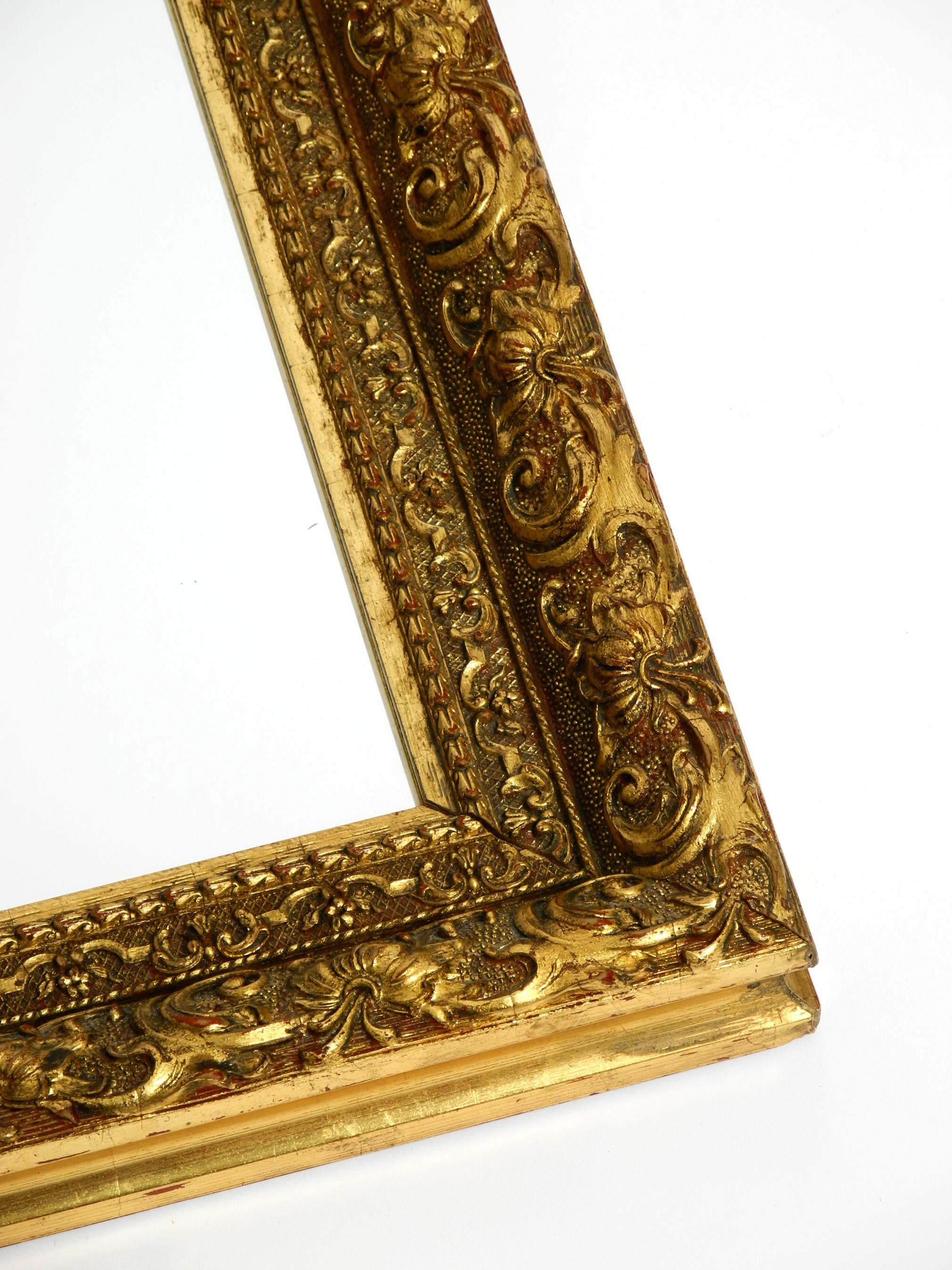 Beautiful Mid Century Wall Mirror from Italy with an Ornate, Gold-Plated Frame For Sale 7