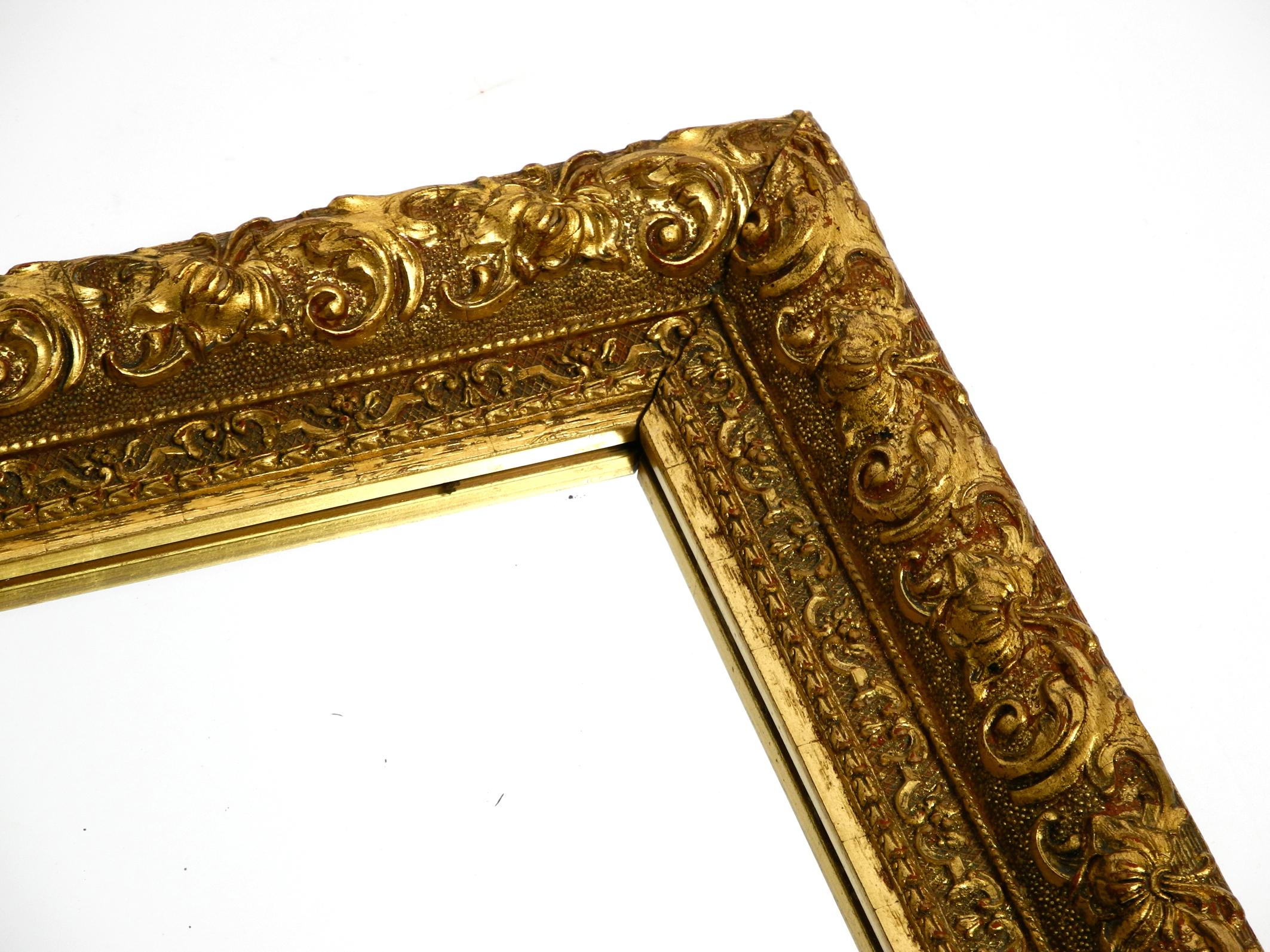 Beautiful Mid Century Wall Mirror from Italy with an Ornate, Gold-Plated Frame For Sale 11