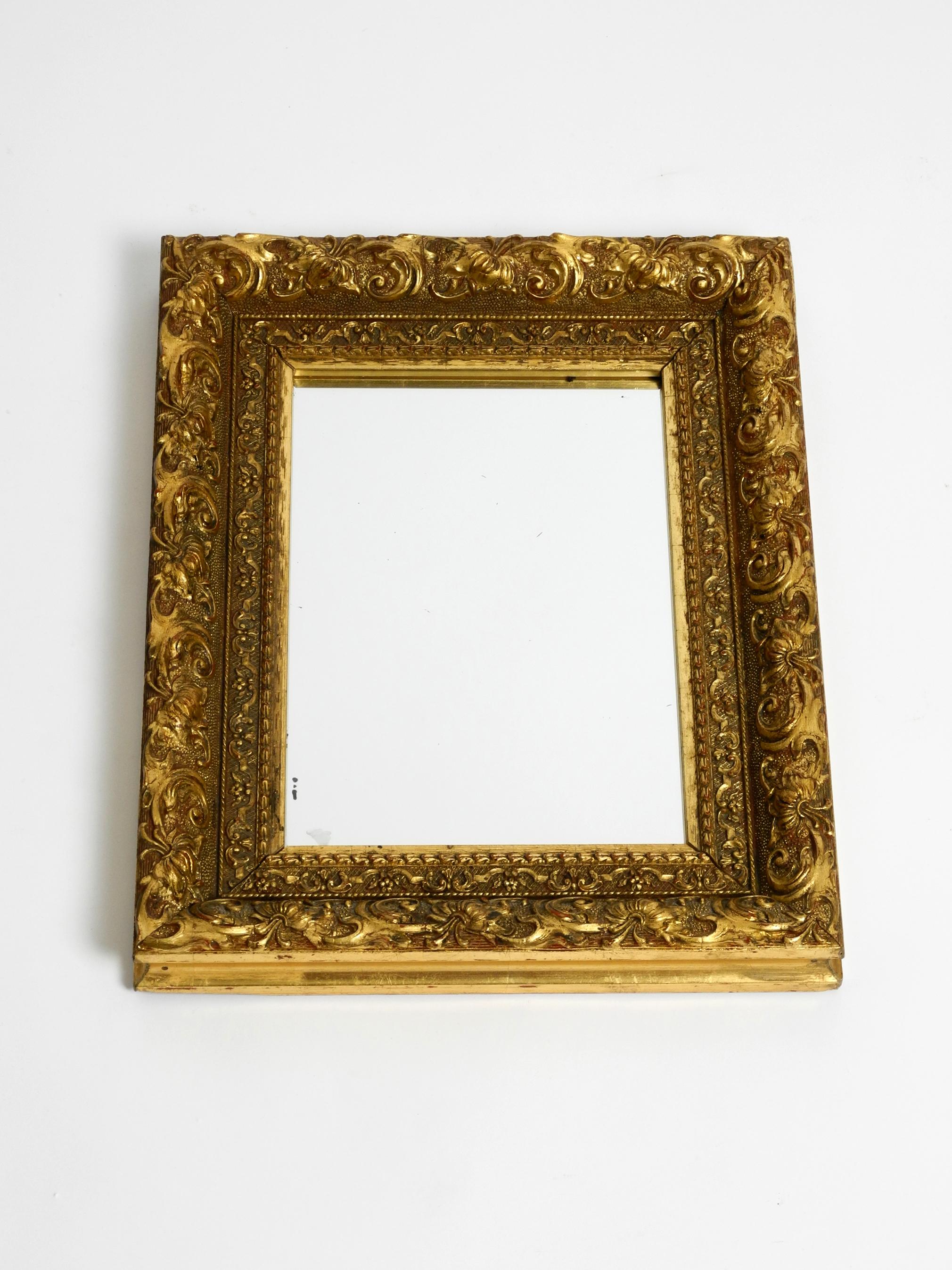 Beautiful Mid Century Wall Mirror from Italy with an Ornate, Gold-Plated Frame For Sale 12
