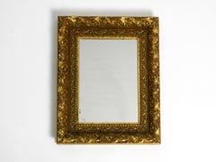 Beautiful Mid Century Wall Mirror from Italy with an Ornate, Gold-Plated Frame