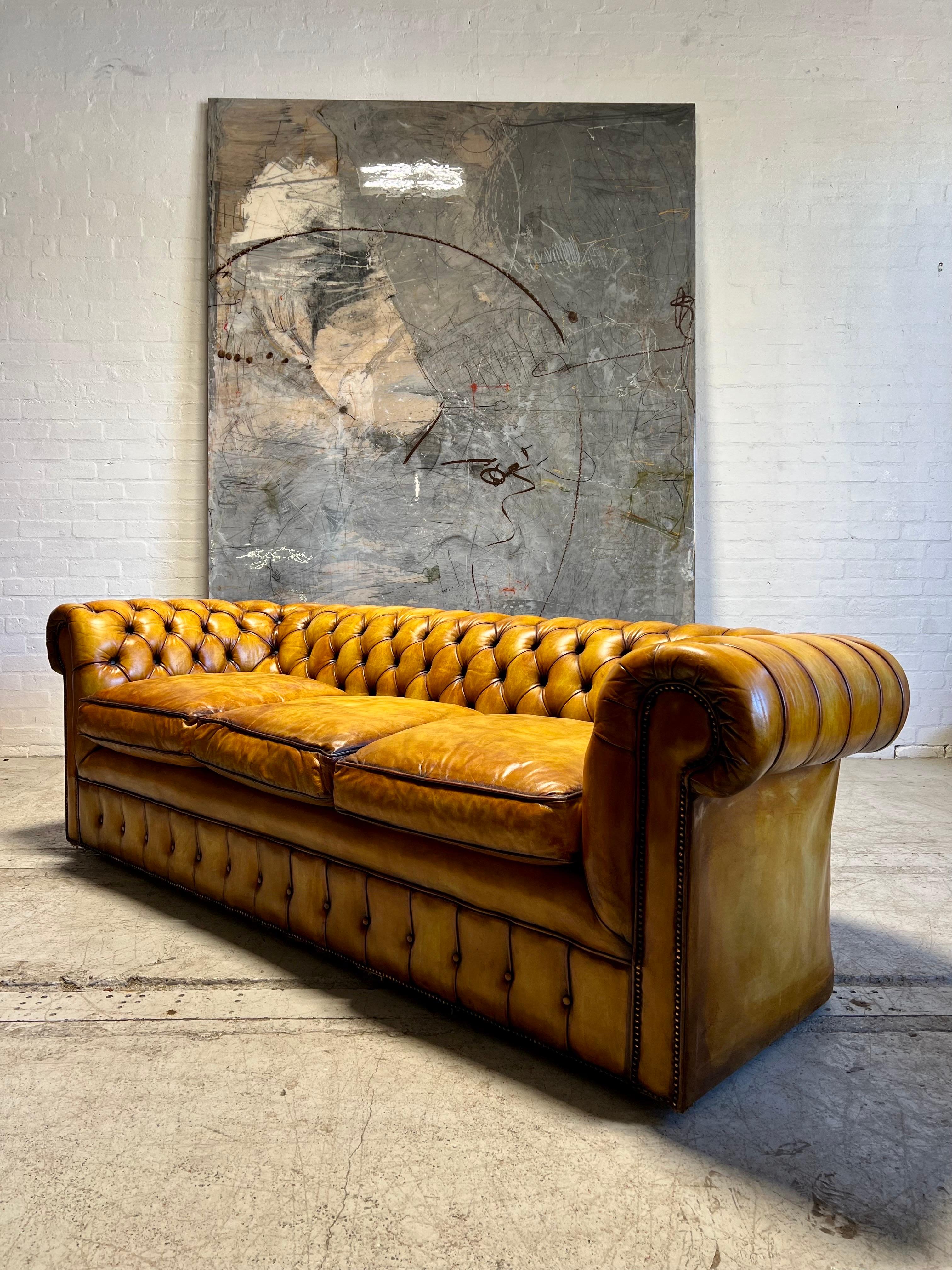 British Beautiful Mid-C Leather Chesterfield Sofa in Hand Dyed Golden Tans For Sale