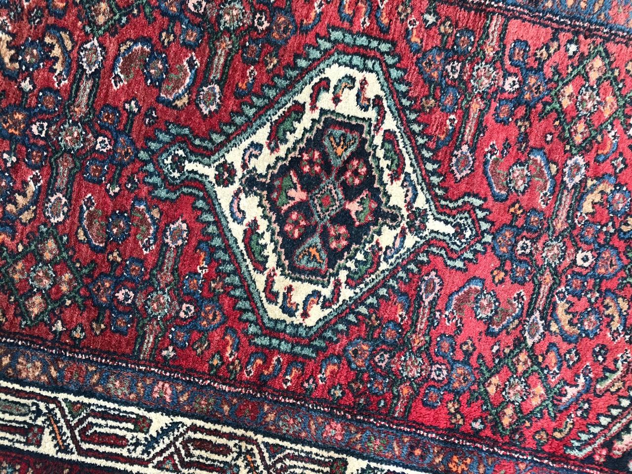 Nice vintage rug with beautiful Mahal design and natural colors with blue, green, orange and red, entirely hand knotted with wool velvet on cotton foundation.