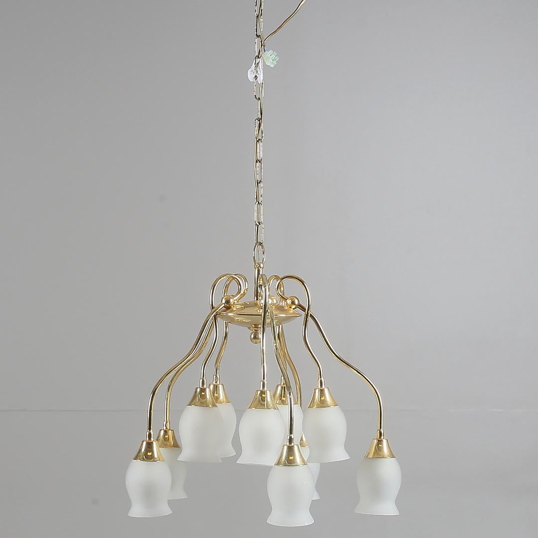 Brass frame with ten opaline glass shades, fitted with E14 sockets, made in Sweden in the late 1960s.