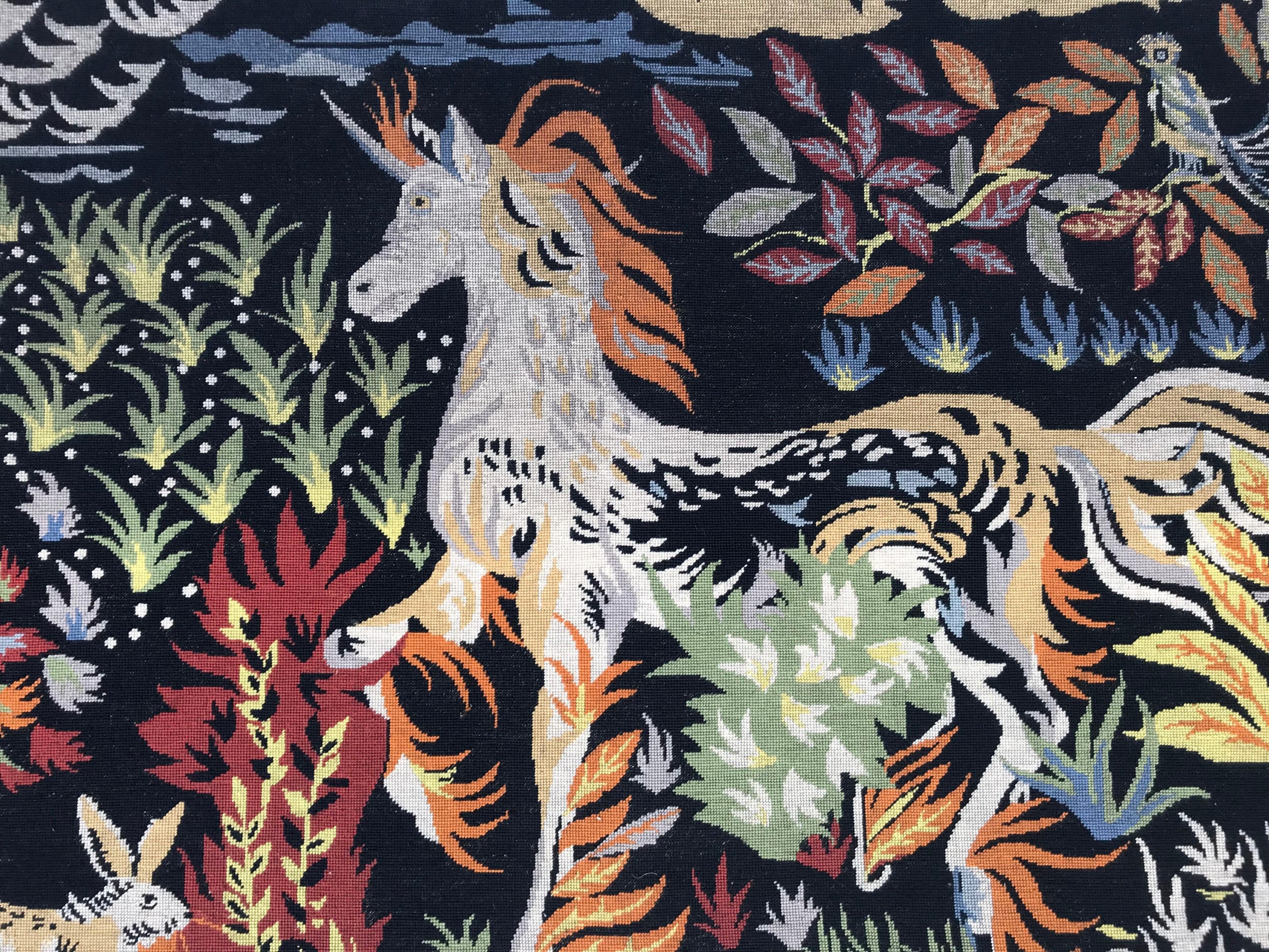 Nice modern Art Deco French tapestry, with beautiful modern design with a horse and rabbit, and nice colors with black field, green, orange, purple, pink and blue, entirely hand embroidered with needlepoint method with wool.