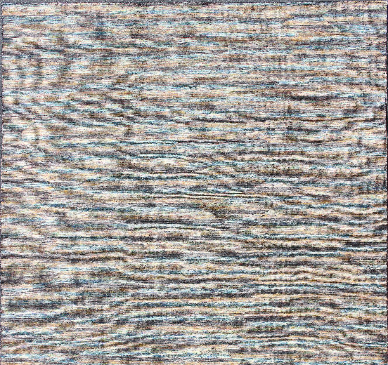 Multi colored modern distressed piled rug in an abstract design, rug KHN-1016-TR-976, country of origin / type: India / Modern Piled rug.

A unique blend of modern and minimalist design, this dynamic and exciting composition is beautifully suited