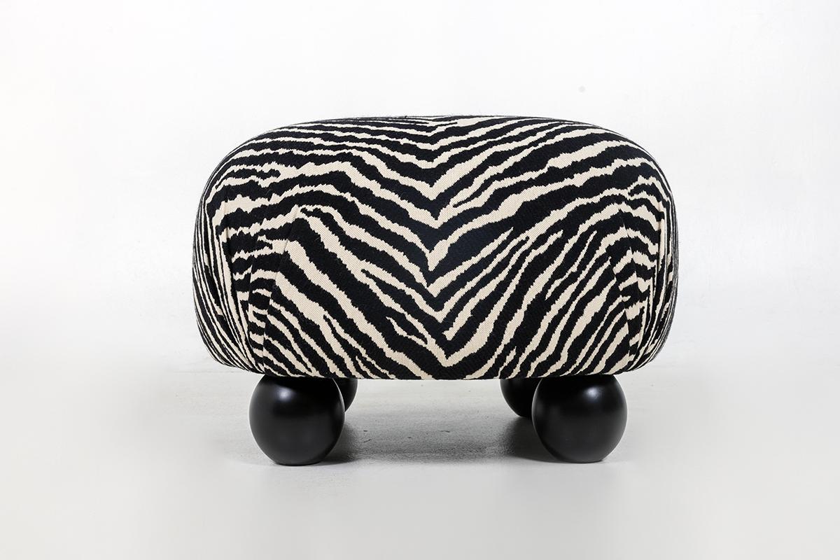 Beautiful Modern Ottoman in the style of Josef Frank, ottoman has four solid wood bun feet, upholstered in best zebra fabric money can buy. Fabric is about 60% virgin wool.
Ready for a new home, excellent condition.One ottoman ready to ship. More