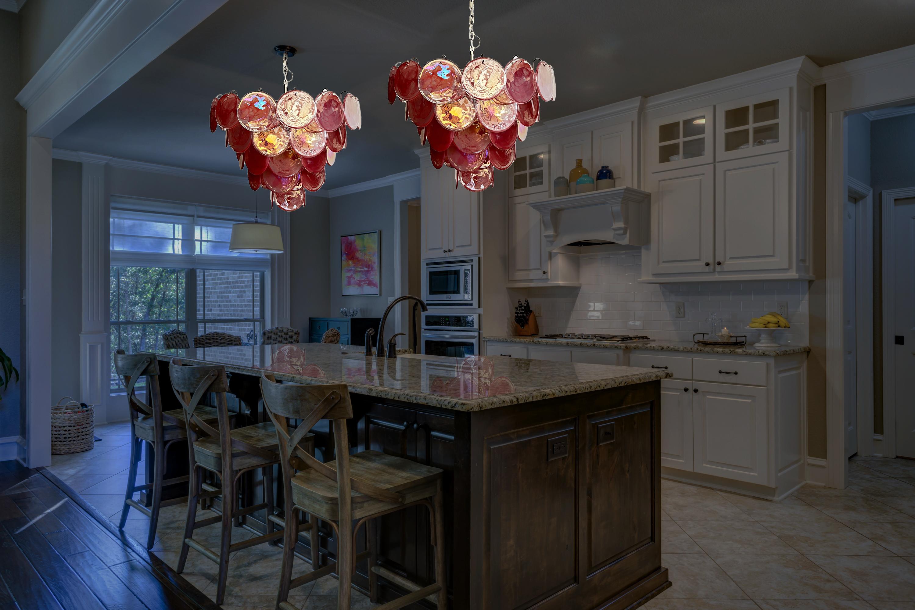Italian Murano chandeliers. Each chandelier has 57 Murano PINK alabaster iridescent glass disks. The glasses are now unavailable, they have the particularity of reflecting a multiplicity of colors, which makes the chandelier a true work of art.
