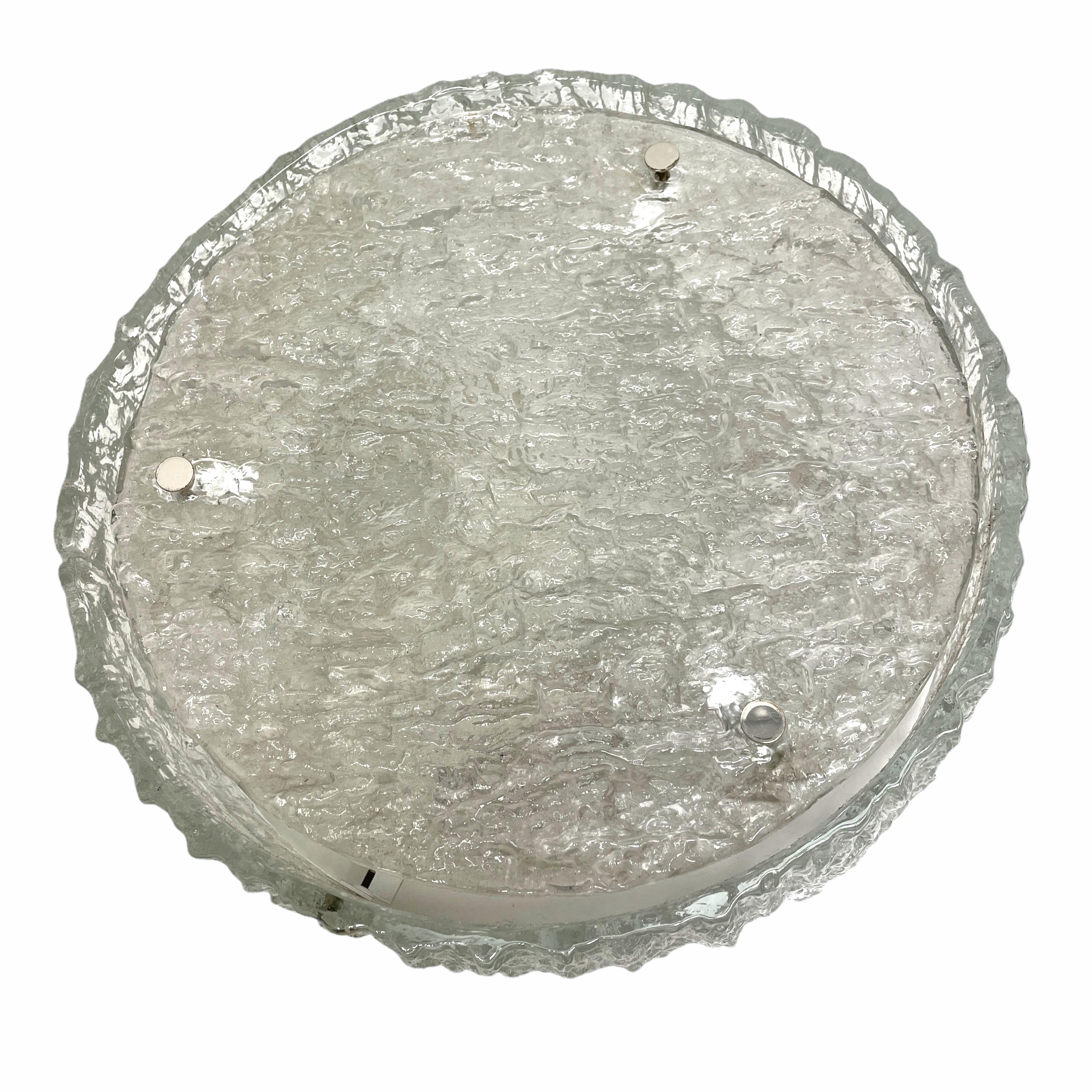 Gorgeous large two part drum-shaped flush mount chandelier with one ring outside and a flat disc made of heavy textured clear iced Murano glass on a white metal frame with nickel finals. Manufactured by Kaiser Lighting, Germany in the 1960s. The