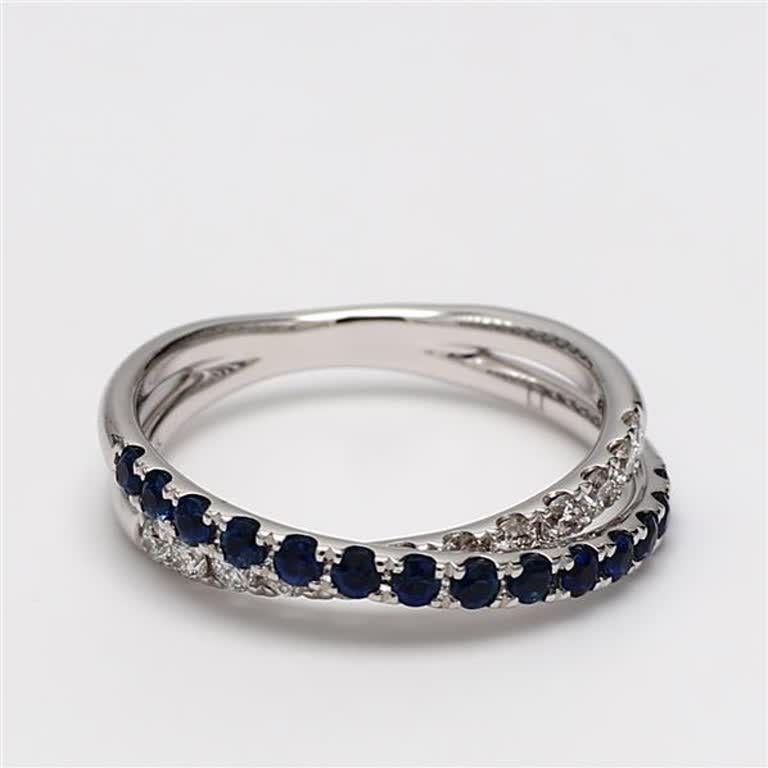 Contemporary Natural Blue Round Sapphire and White Diamond .84 Carat TW White Gold Band For Sale
