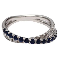 Natural Blue Round Sapphire and White Diamond .84 Carat TW White Gold Band
