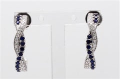 Natural Blue Round Sapphire and White Diamond .65 Carat TW White Gold Earrings