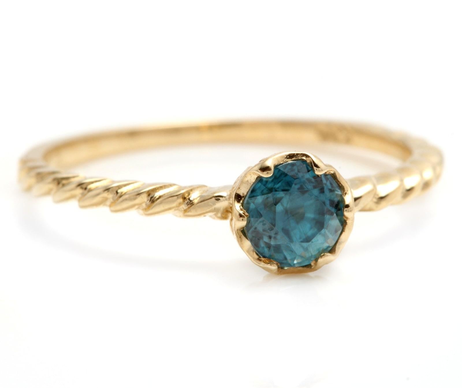 Beautiful Natural Blue Zircon 14K Solid Yellow Gold Ring

Total Natural Round Shaped Zircon Weights: Approx. 0.90 Carats 

Zircon Measures: Approx. 5.00mm

Ring size: 7 (free re-sizing available)

Ring total weight: Approx. 1.5 grams

Disclaimer: