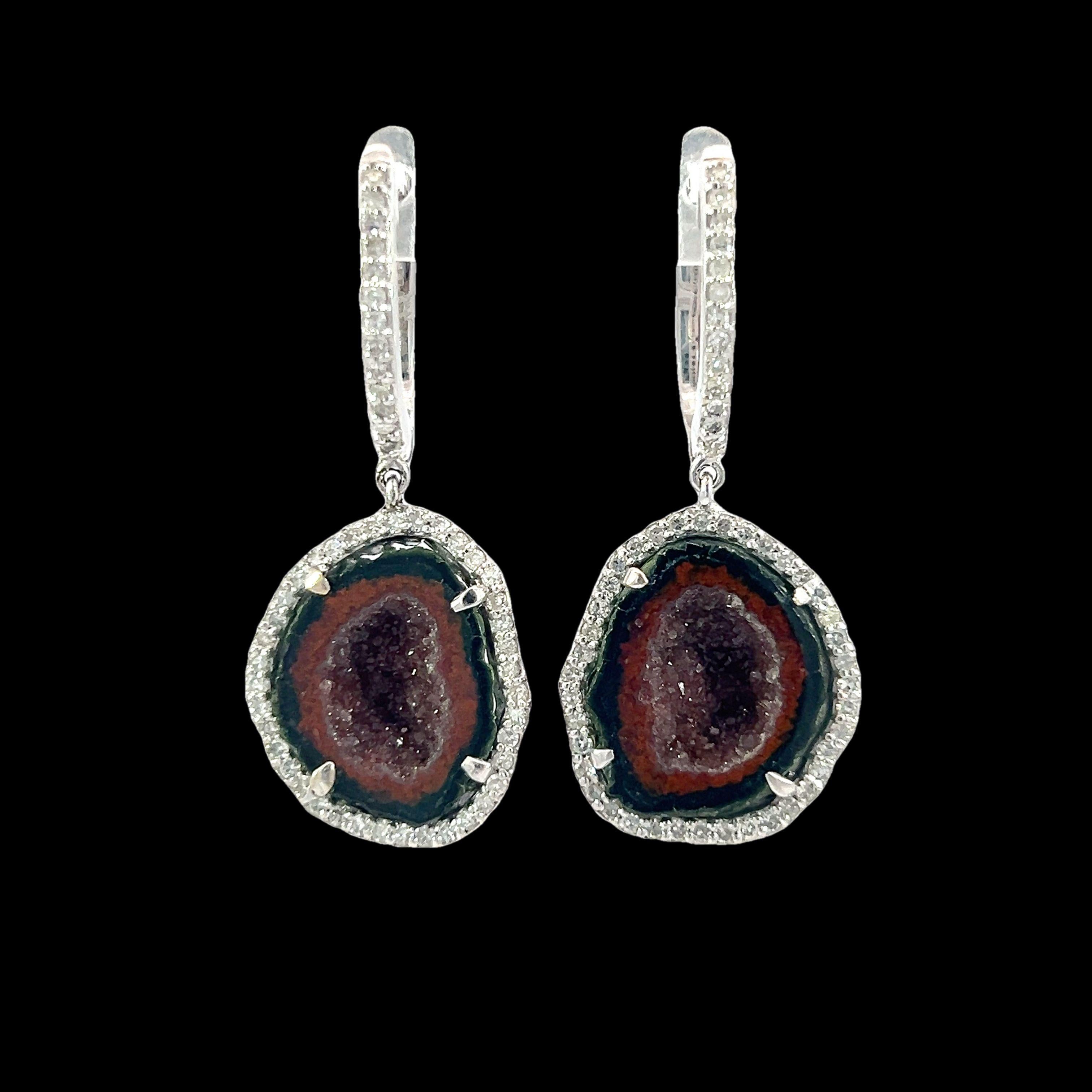 These exquisite earrings feature with 11.75-carat of stunning Druzy quartz and 0.60-carat of diamonds set in a delicate 18Kt white gold frame. The intricate detailing around the stones adds a touch of sophistication, making them perfect for both