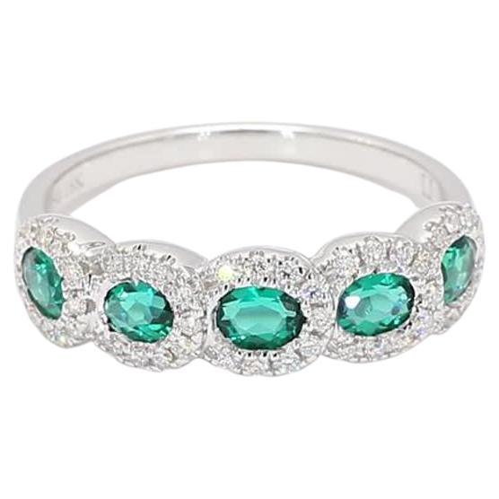 Natural Oval Emerald and White Diamond White Gold 1.00 Carat TW Wedding Band For Sale