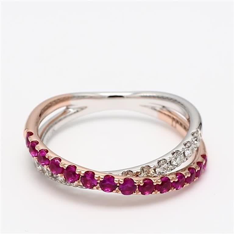 RareGemWorld's classic ruby band. Mounted in a beautiful 14K Rose and White Gold setting with a natural round cut red ruby's complimented by natural round white diamond melee. This band is guaranteed to impress and enhance your personal