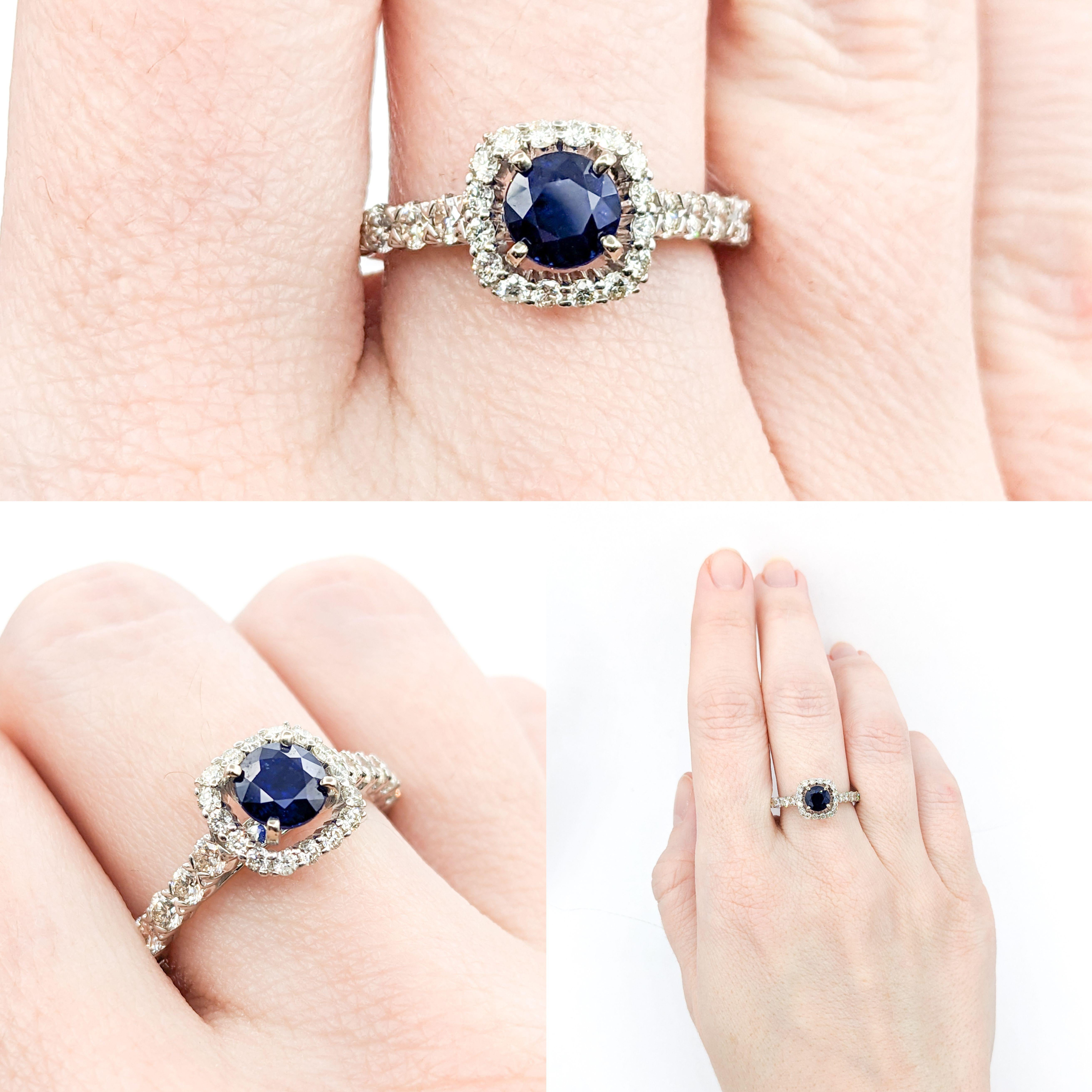 Beautiful Natural Sapphire & Diamond Engagement Ring

This stunning ring is crafted in 14kw white gold and showcases a 1.10ct sapphire, flanked by sparkling diamonds with a total weight of 0.84ctw. The diamonds are of H color and SI1-SI2 clarity,