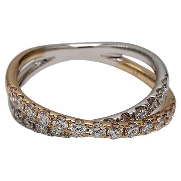 RareGemWorld's classic diamond band. Mounted in a beautiful 14K Yellow and White Gold setting with natural round cut white diamond melee. This wedding band is guaranteed to impress and enhance your personal collection!

Total Weight: .71cts

Length: