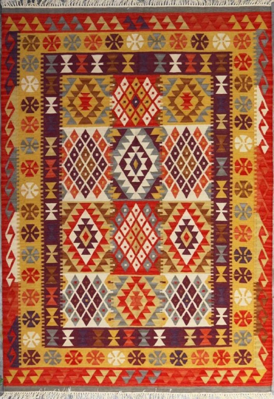 Nice new Kilim with beautiful geometrical design of Turkish Kilims and nice colors, entirely handwoven with wool on cotton foundation. Size: 170 x 240 cm, 5ft 7in x 7ft 10in.