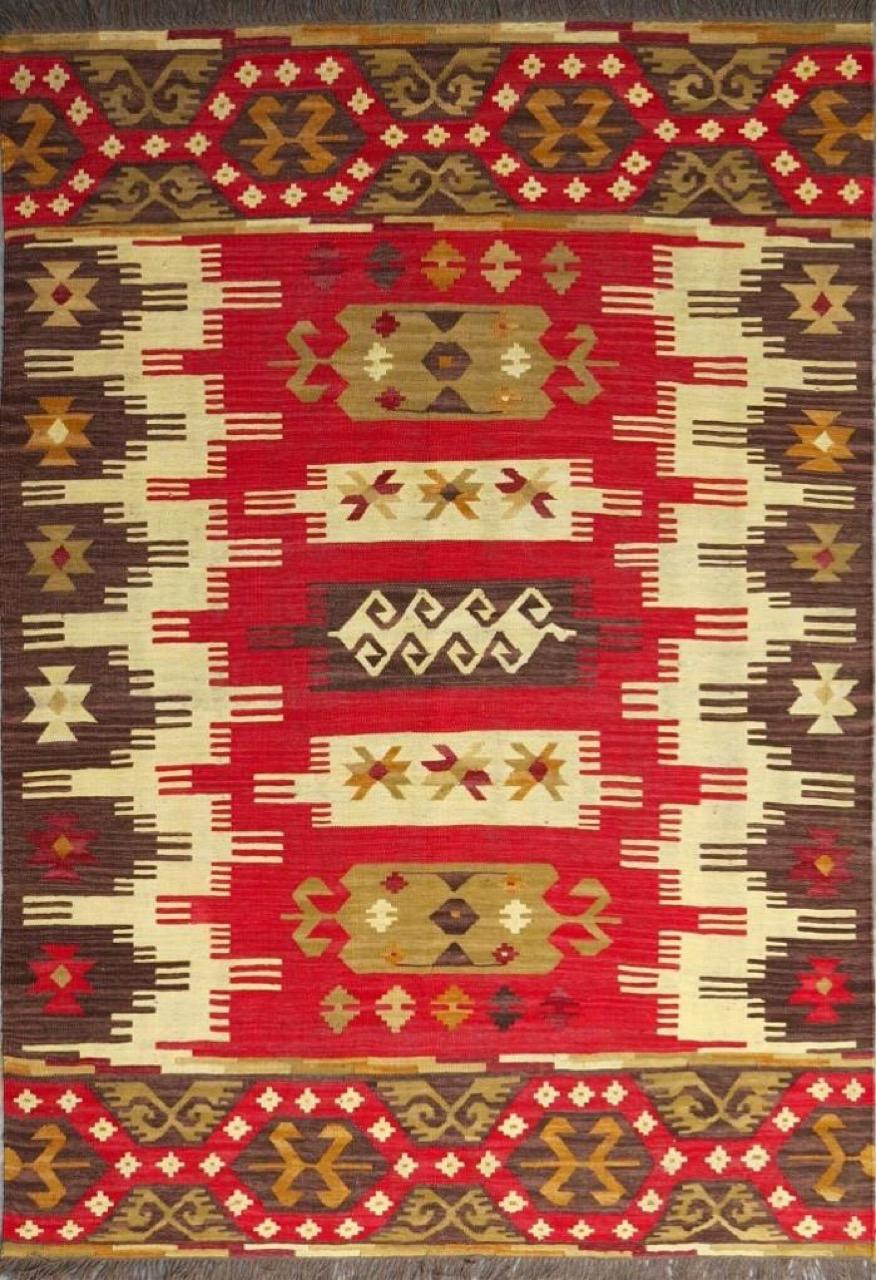 Nice new Kilim with beautiful geometrical design of Turkish Kilims and nice colors, entirely handwoven with wool on cotton foundation. Size: 170 x 240 cm.
