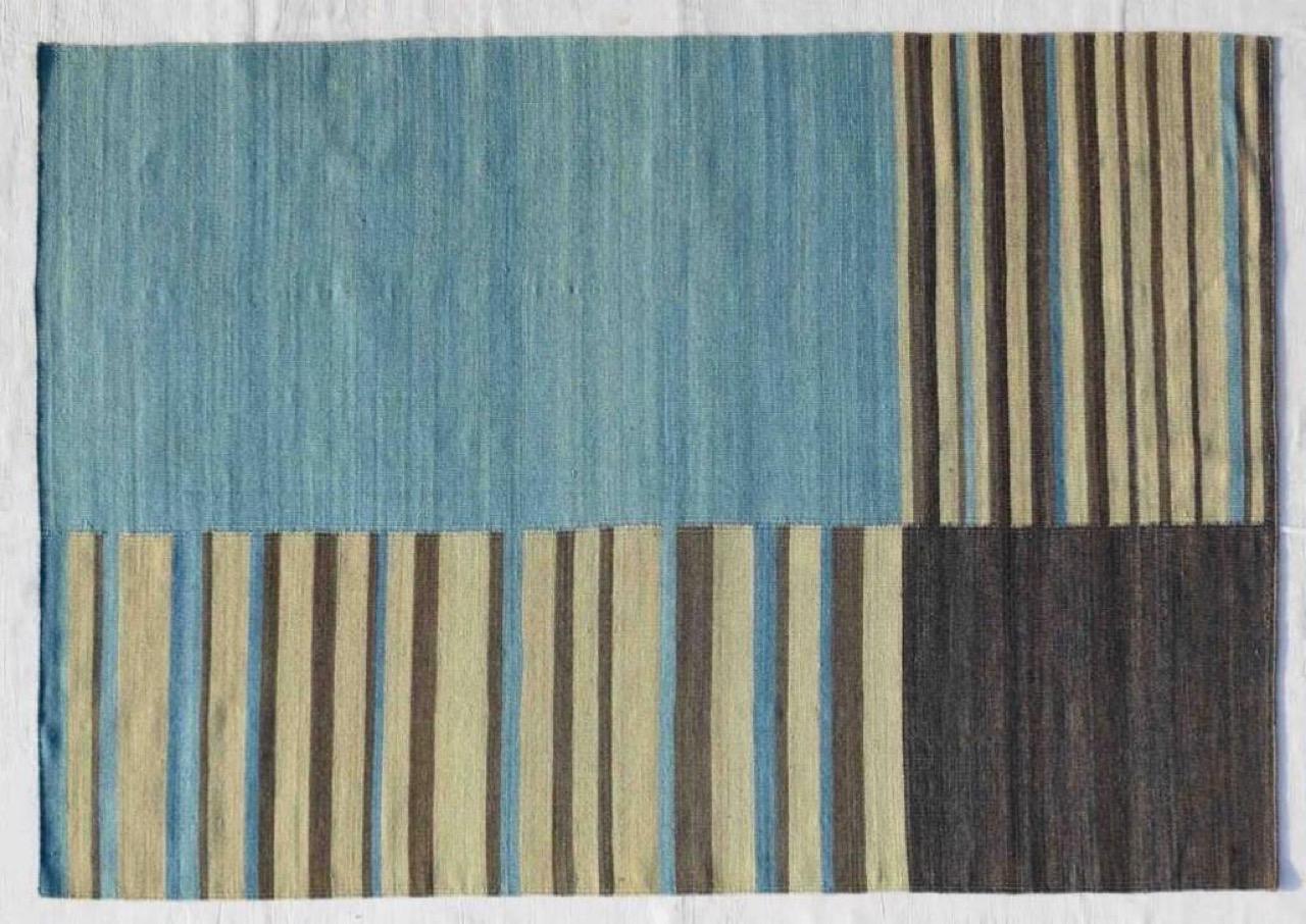 Nice new Kilim with beautiful tribal design of Turkish Kilims and nice colors, entirely handwoven with wool on cotton foundation. Size: 6´x9’ feet.