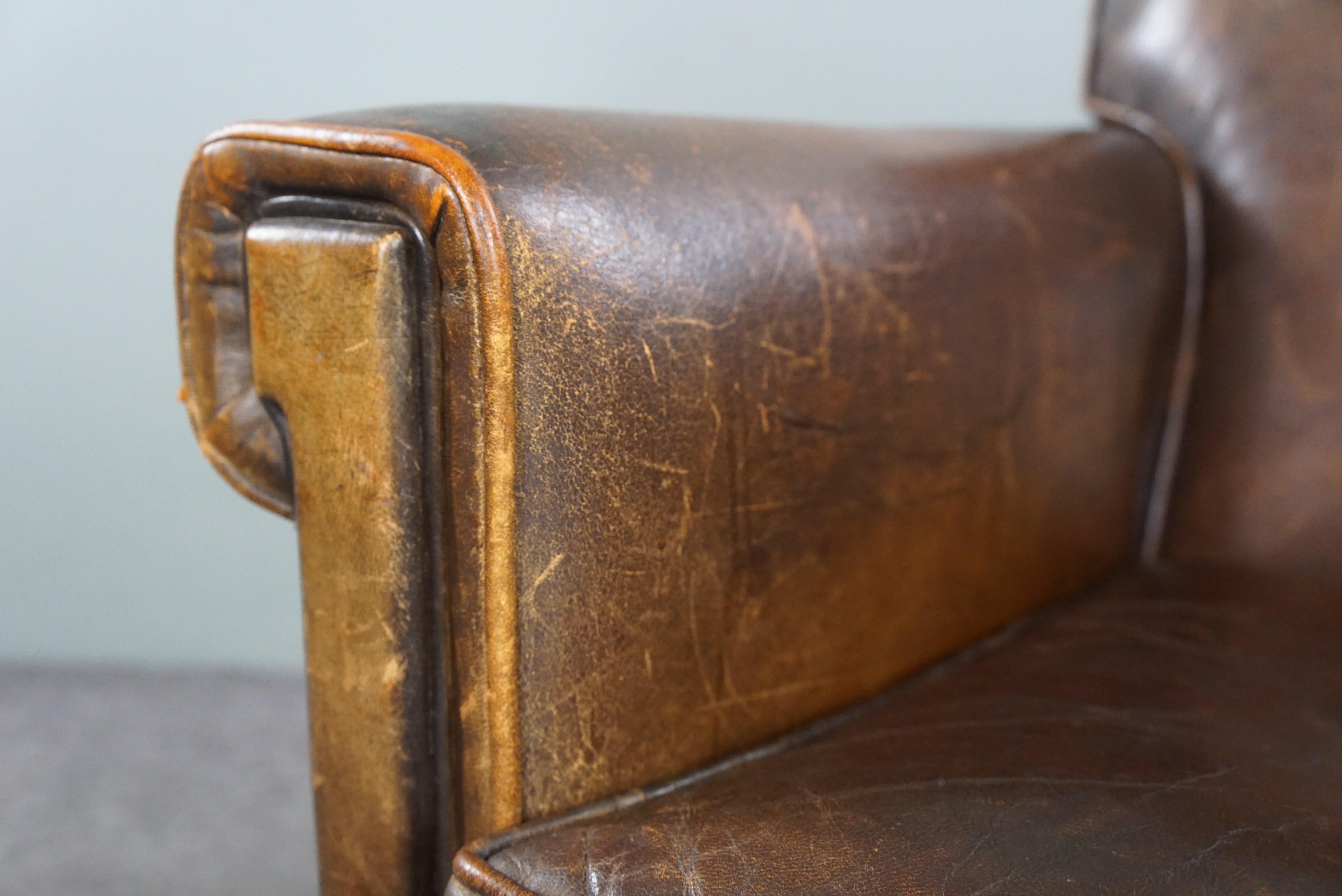 Beautiful old sheep leather armchair with a positively lived-in character For Sale 5