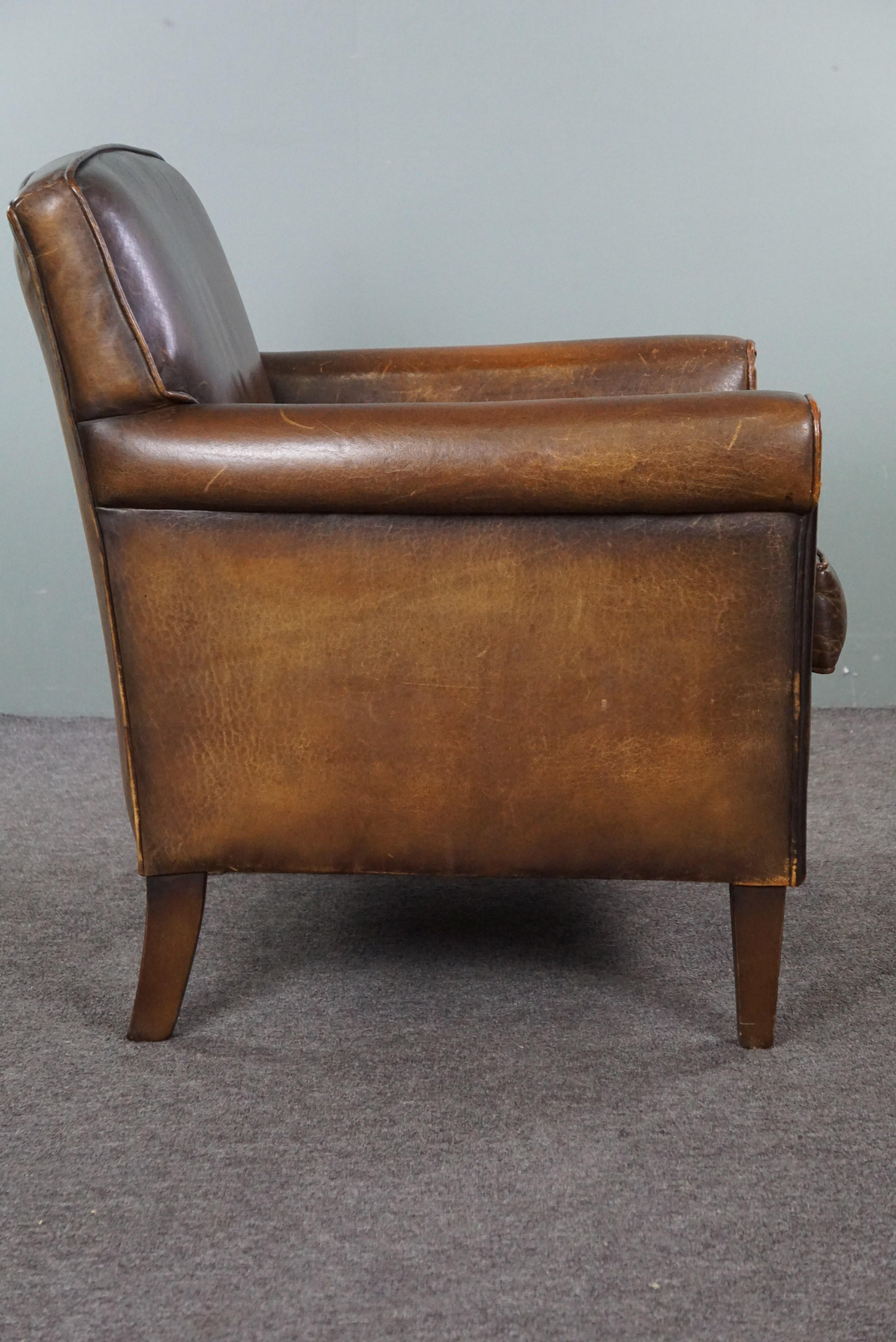 Beautiful old sheep leather armchair with a positively lived-in character In Good Condition For Sale In Harderwijk, NL