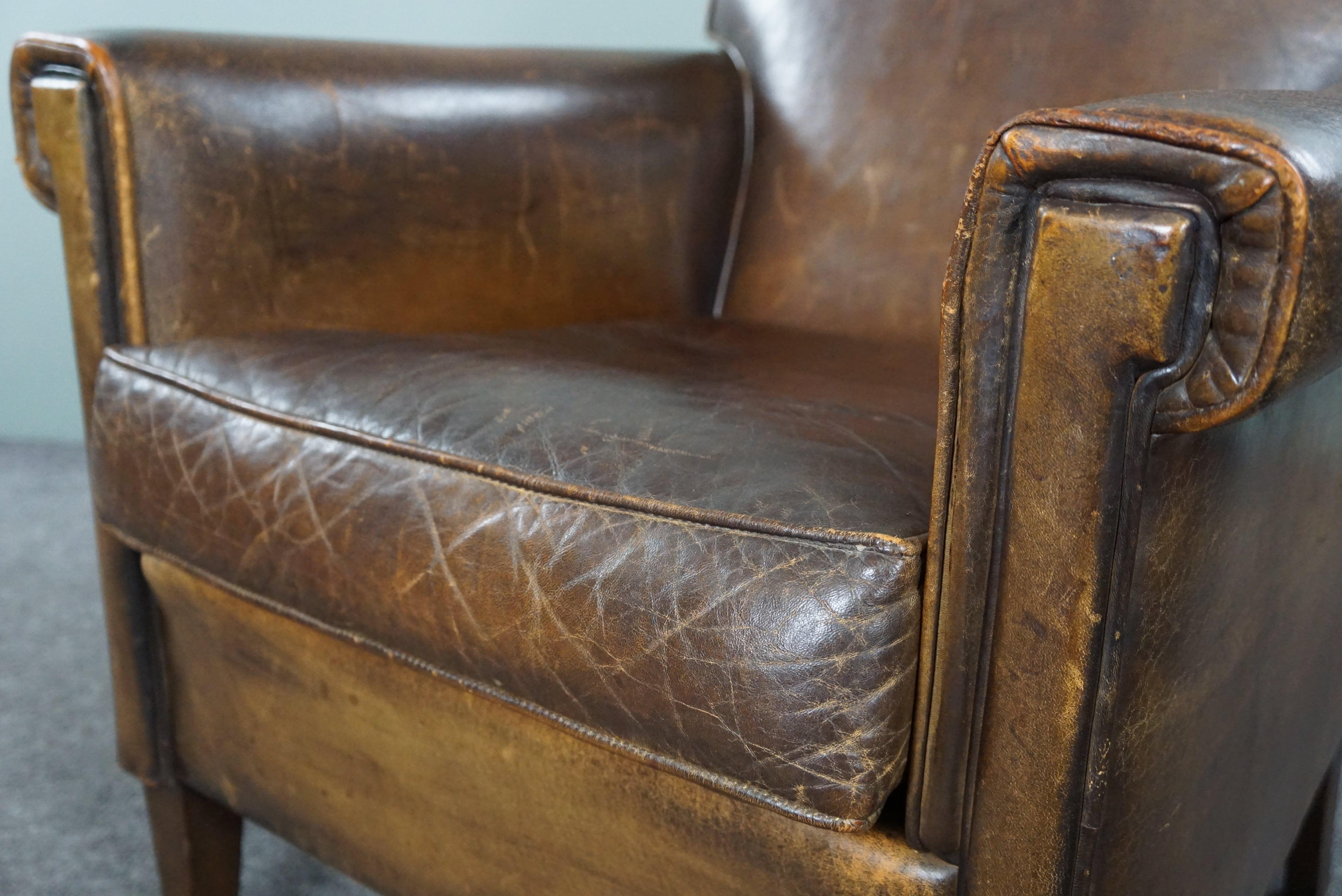Beautiful old sheep leather armchair with a positively lived-in character For Sale 4