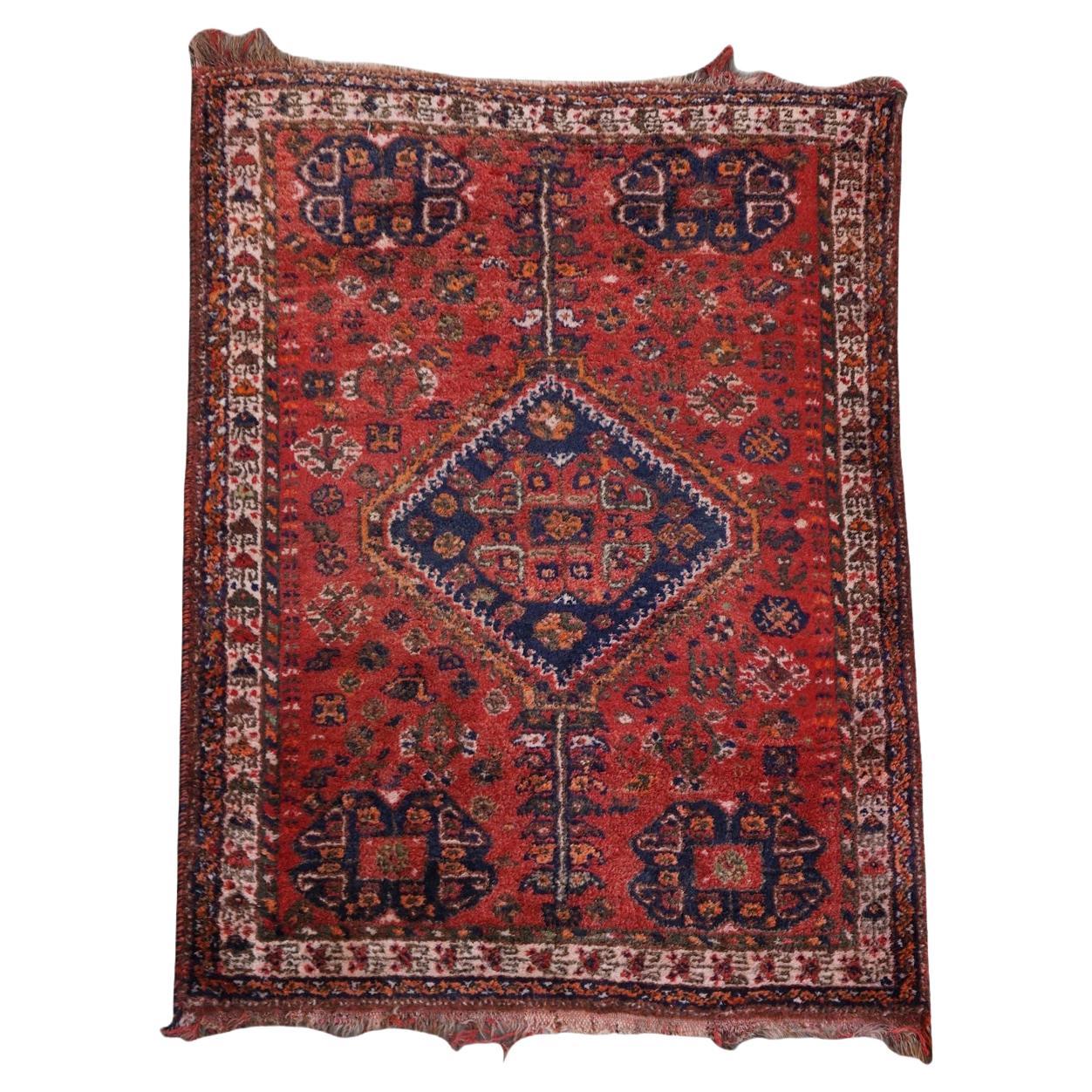 Bellissimo tappeto orientale d'epoca con toni prevalentemente rossi 168x112cm