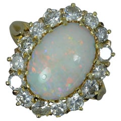 Beautiful Opal and 1.50ct Diamond 18 Carat Gold Cluster Ring