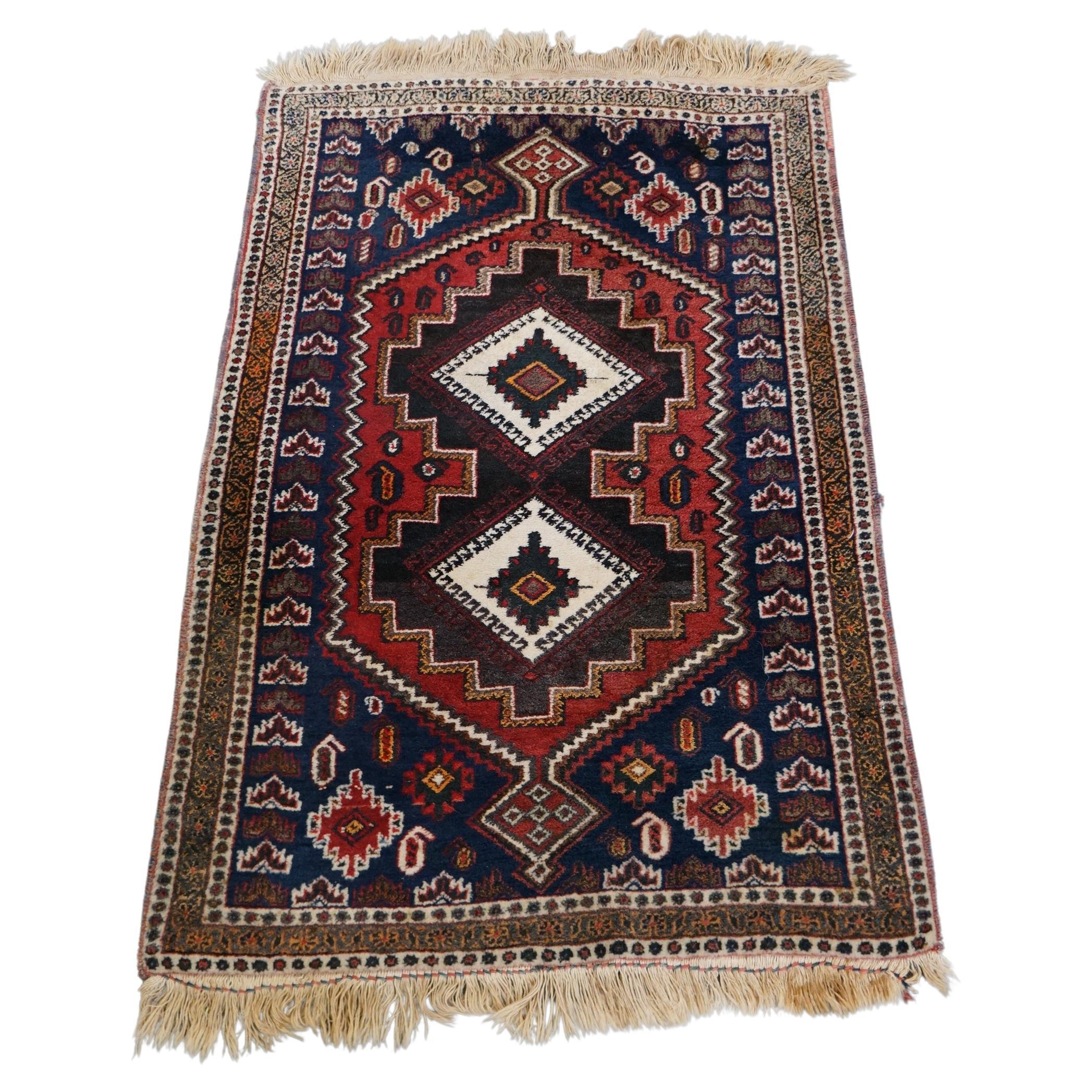 Beautiful oriental rug with beautiful colors and interesting patterns 110x75cm