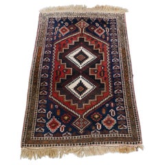 Beautiful oriental rug with beautiful colors and interesting patterns 110x75cm