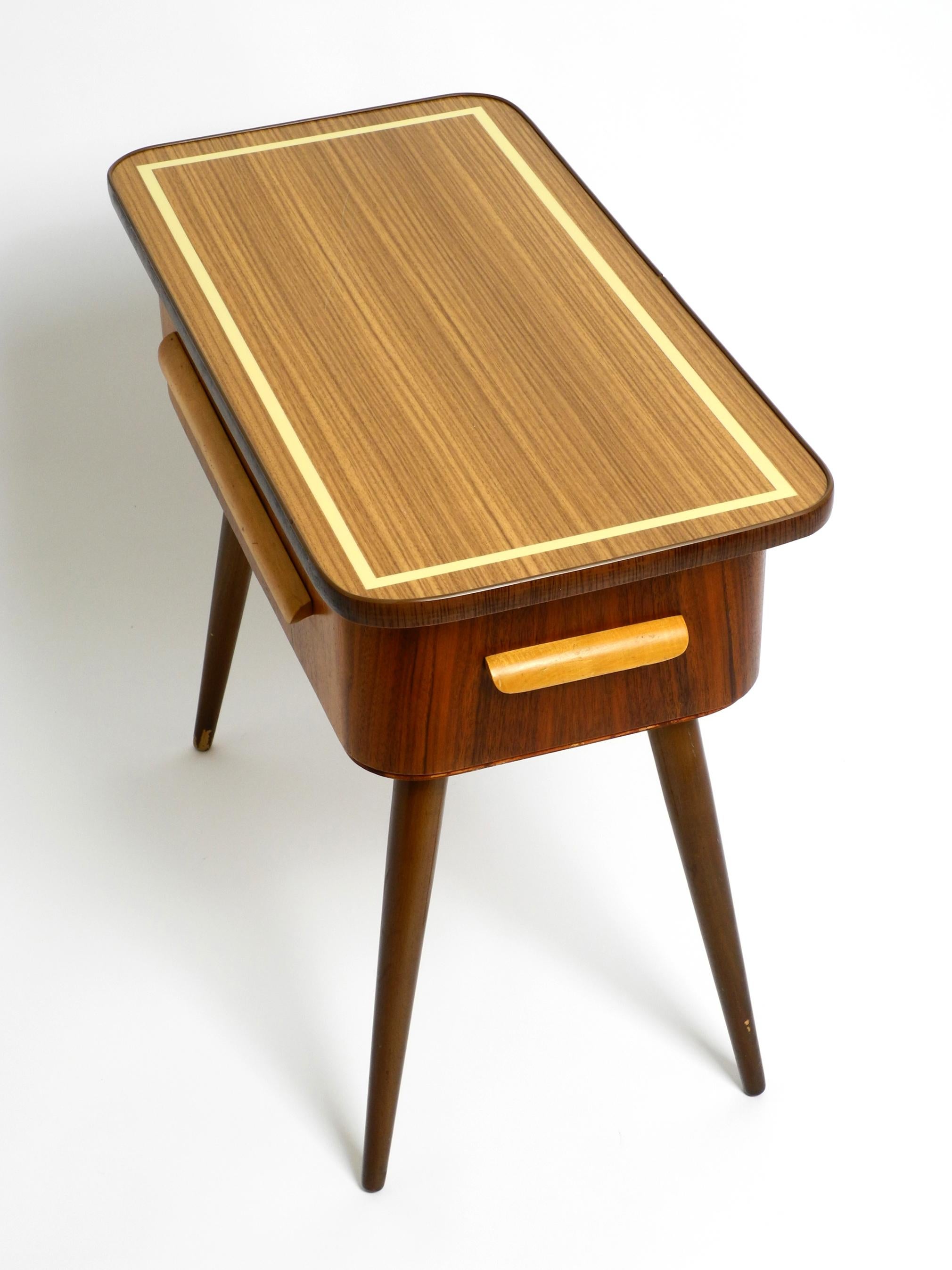 European Beautiful Original 1950s Sewing Box with Teak Veneer with Hinged Table Top For Sale