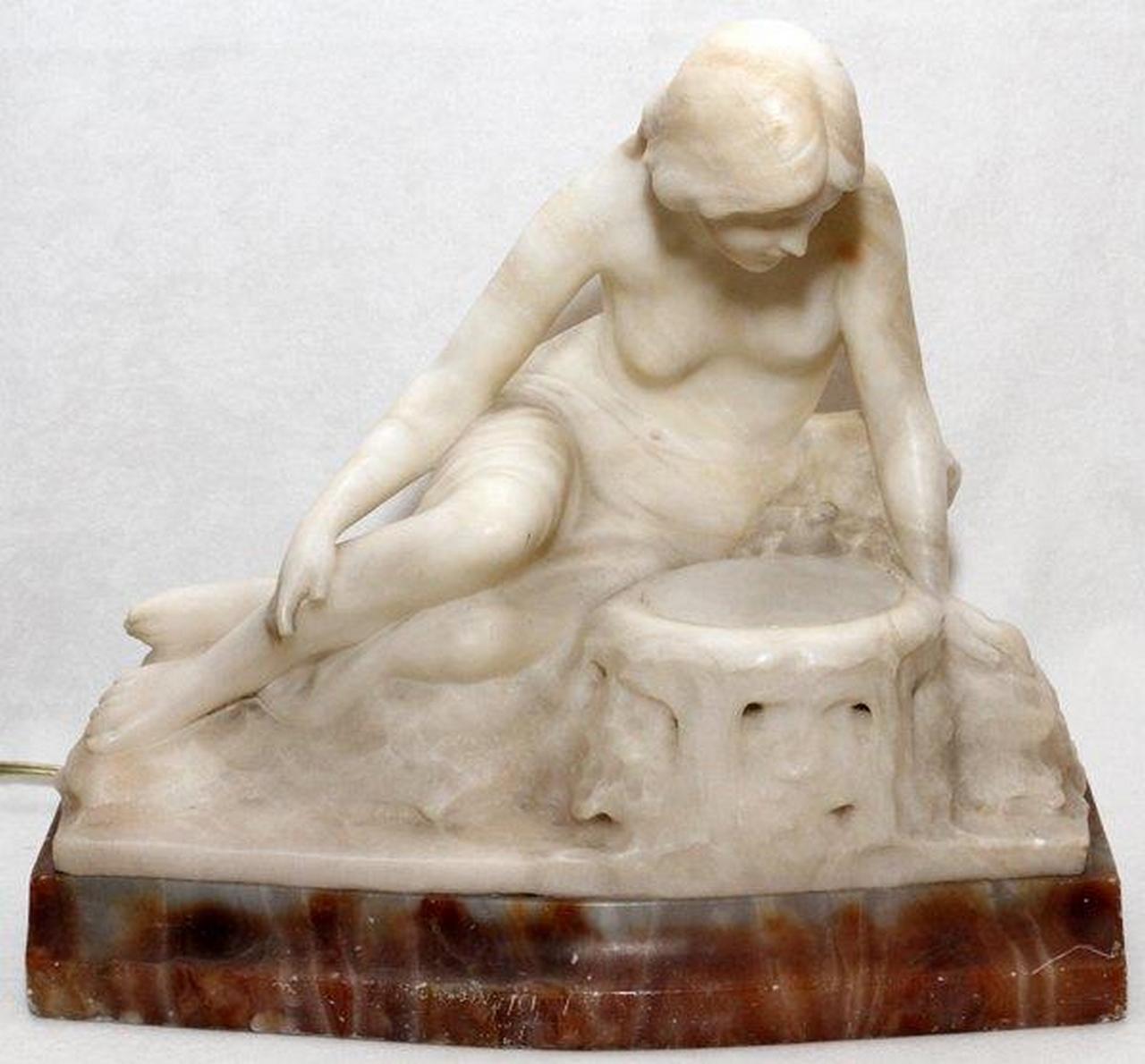 The Following Item is a Museum Quality Original Beautiful Italian White Marble and Alabaster Lamp Sculpture of a Figural Nude Woman Sitting on a Rock by Artist Ferdinando Vichi (1875-1925), Circa 1895. Signed F. Vichi Made in Italy. 
Measurements: