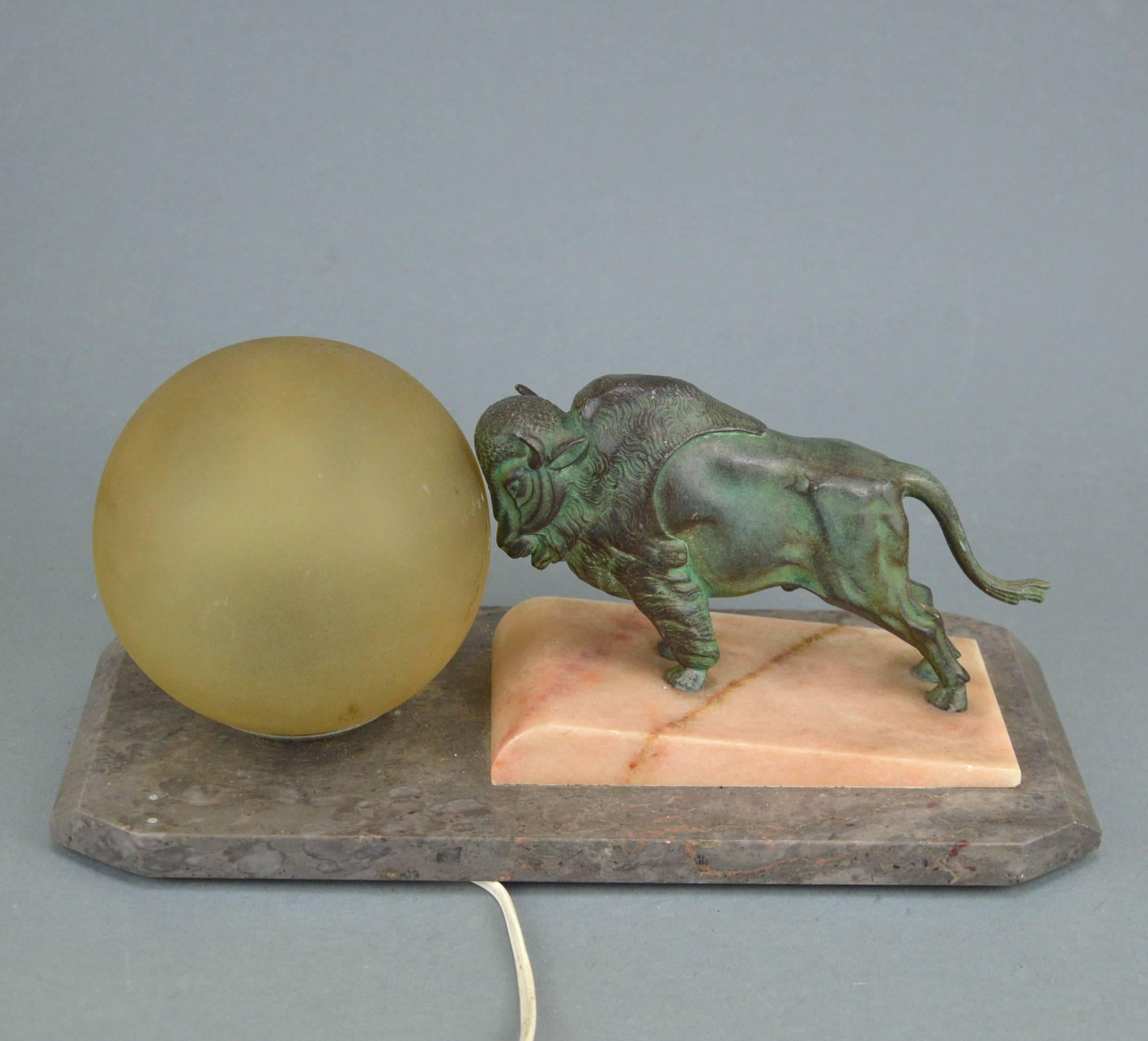 Patinated Beautiful Original Art Deco Lamp Representing a Bison Pushing a Ball, 1920