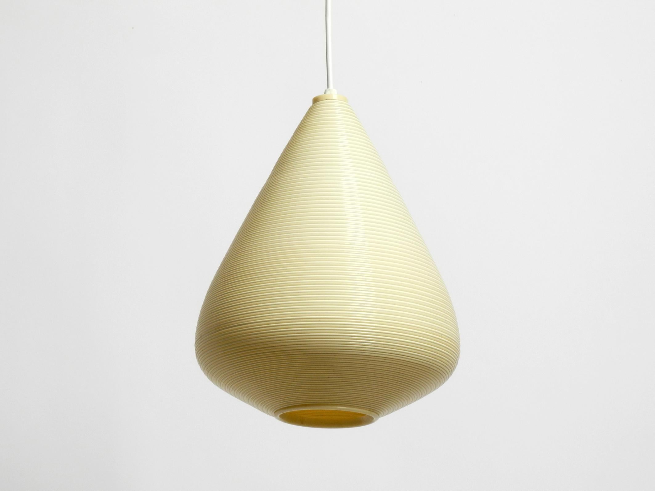 Beautiful original large 1960s beige Heifetz Rotaflex pendant lamp in a teardrop shape.
Great glare-free light for all living spaces.
Very good original condition with no damage.
100% original condition and fully functional. Without canopy.
One E27