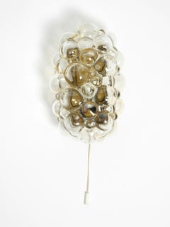 Beautiful original Mid Century glass bubble wall lamp. Design by Helena Tynell