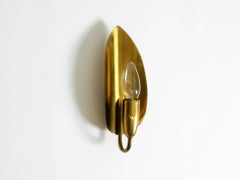Beautiful original Mid Century Modern cone wall lamp made of brass