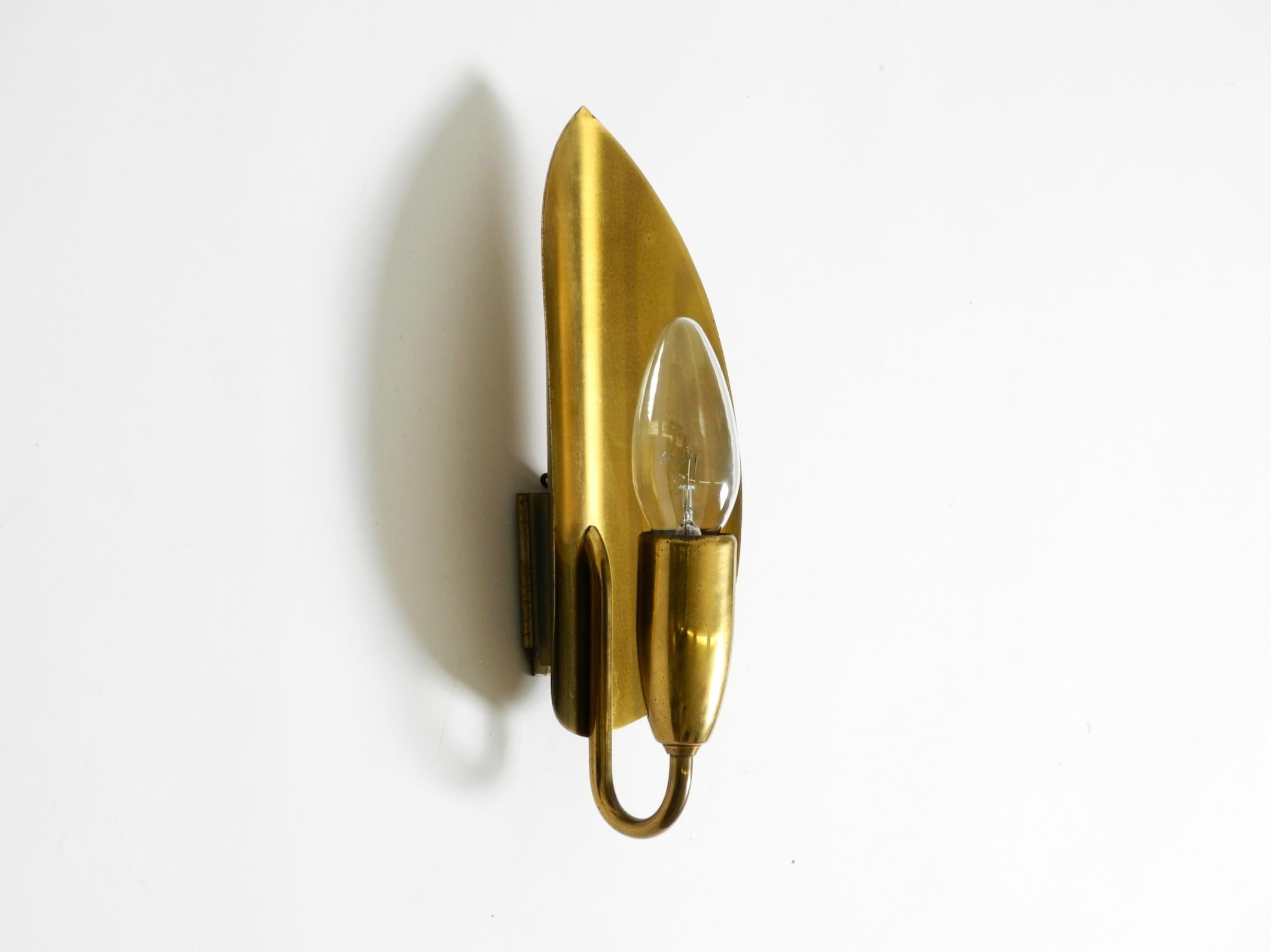 Mid-Century Modern Beautiful original Mid Century Modern cone wall lamp made of brass For Sale