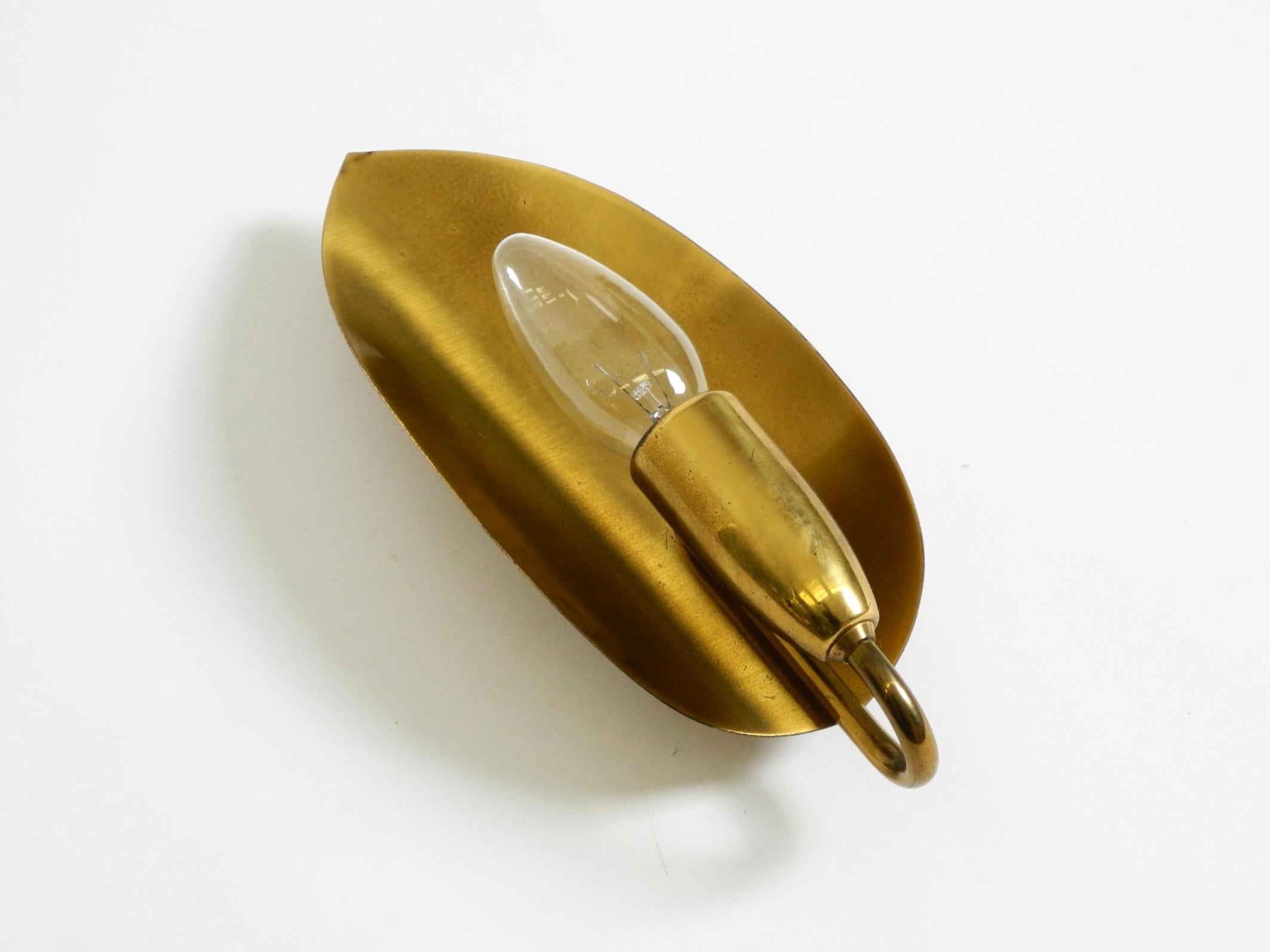 Mid-20th Century Beautiful original Mid Century Modern cone wall lamp made of brass For Sale