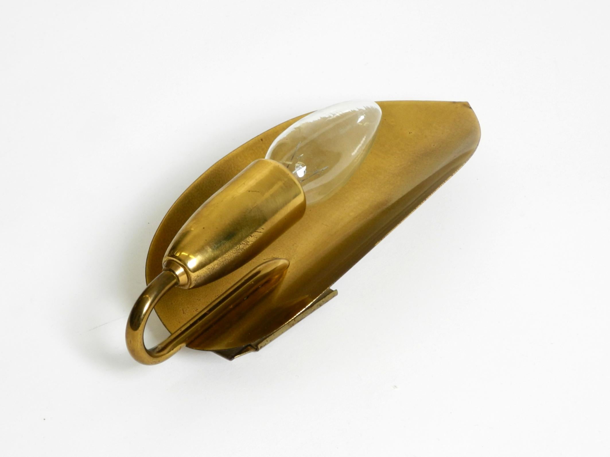 Brass Beautiful original Mid Century Modern cone wall lamp made of brass For Sale