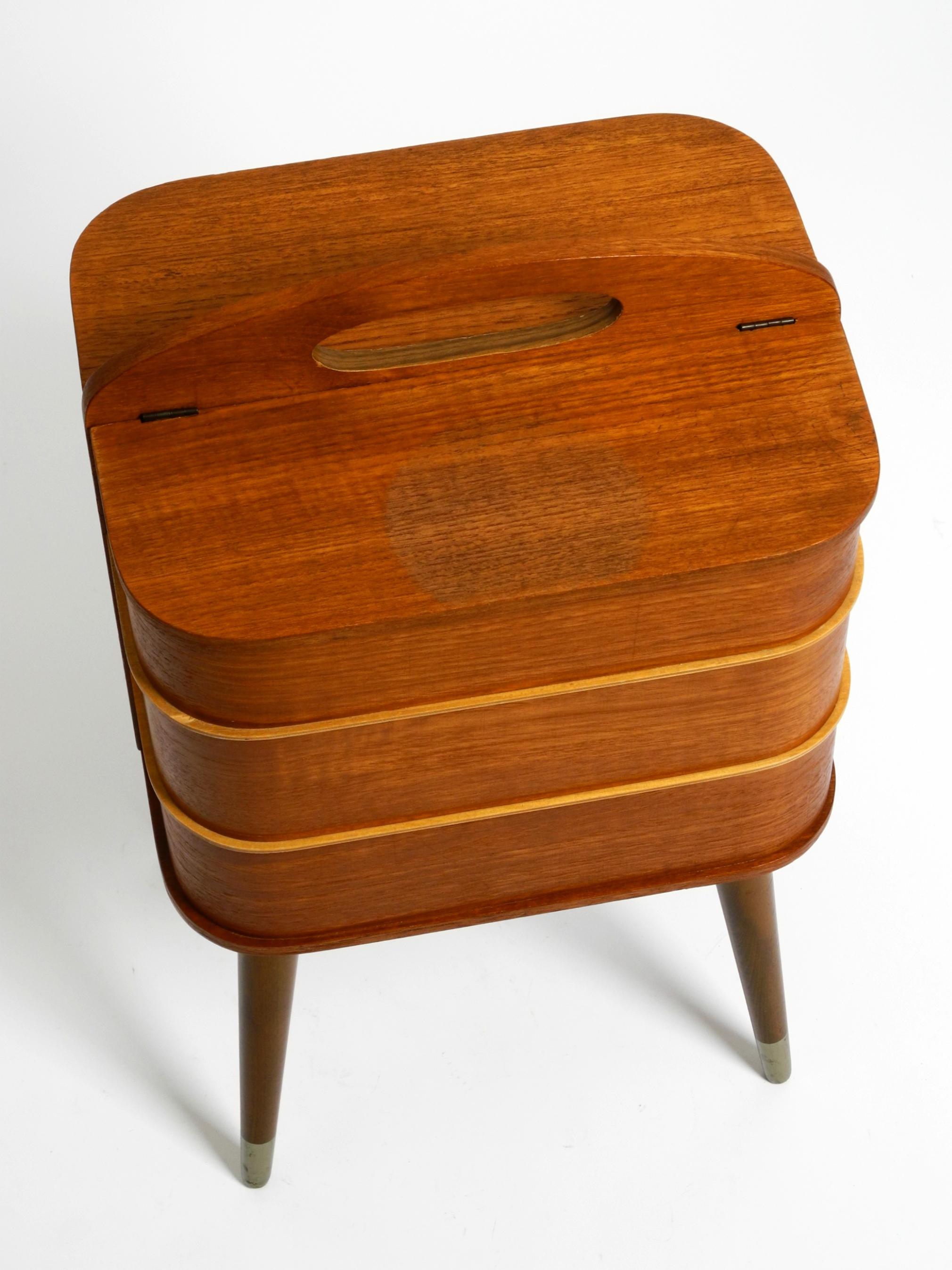 Mid-20th Century Beautiful original Mid Century sewing box with teak veneer and many compartments