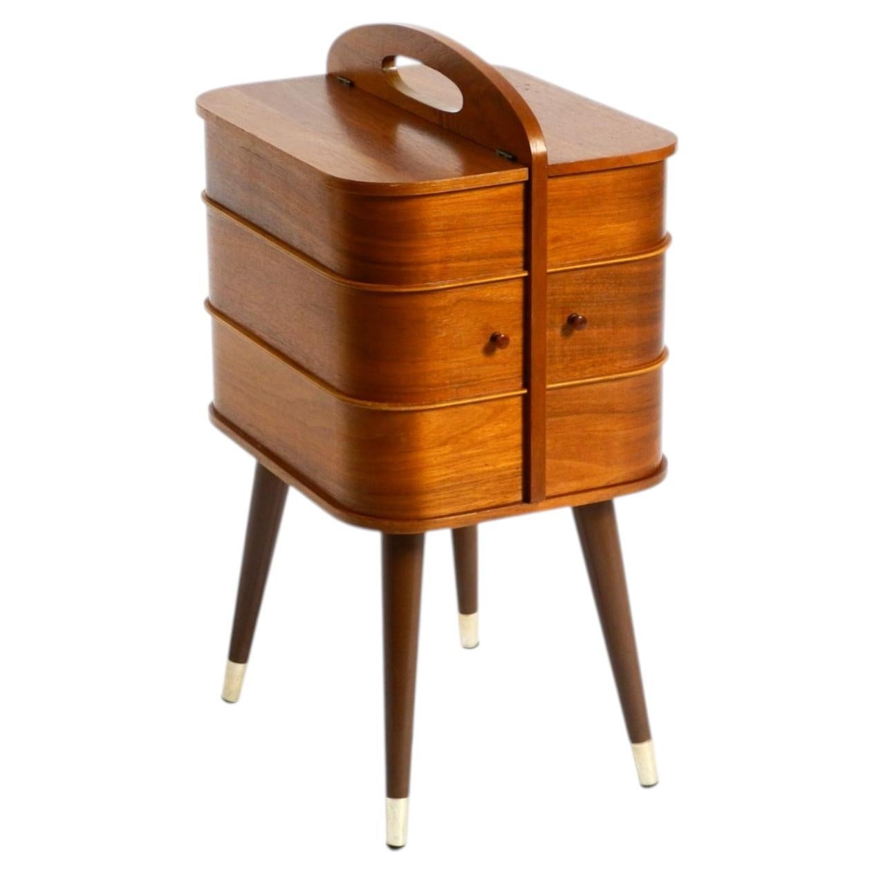 Beautiful original Mid Century sewing box with teak veneer and many compartments