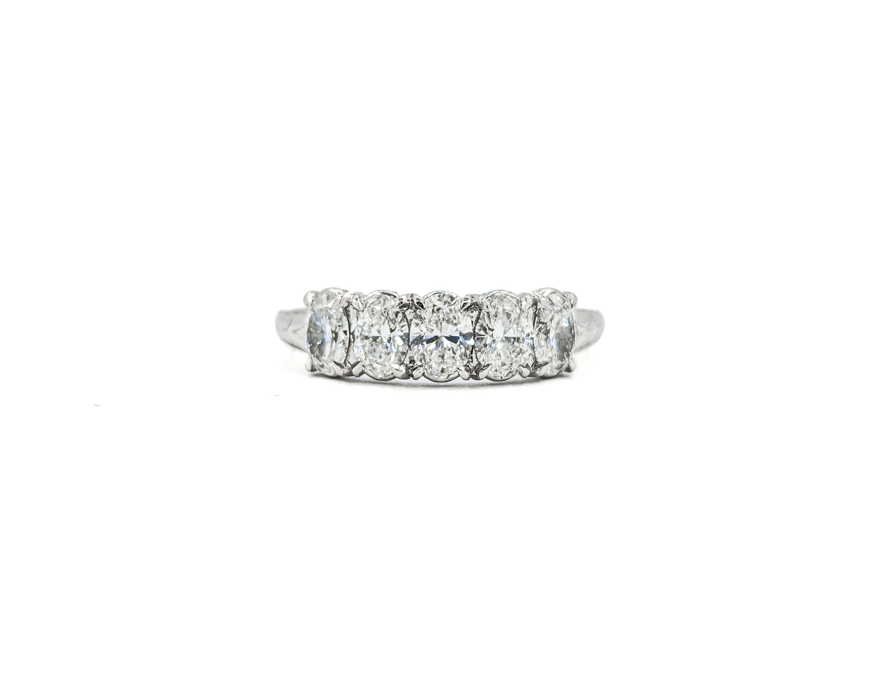 Beautiful Oval Diamond 5-Stone Ring in Platinum For Sale 5